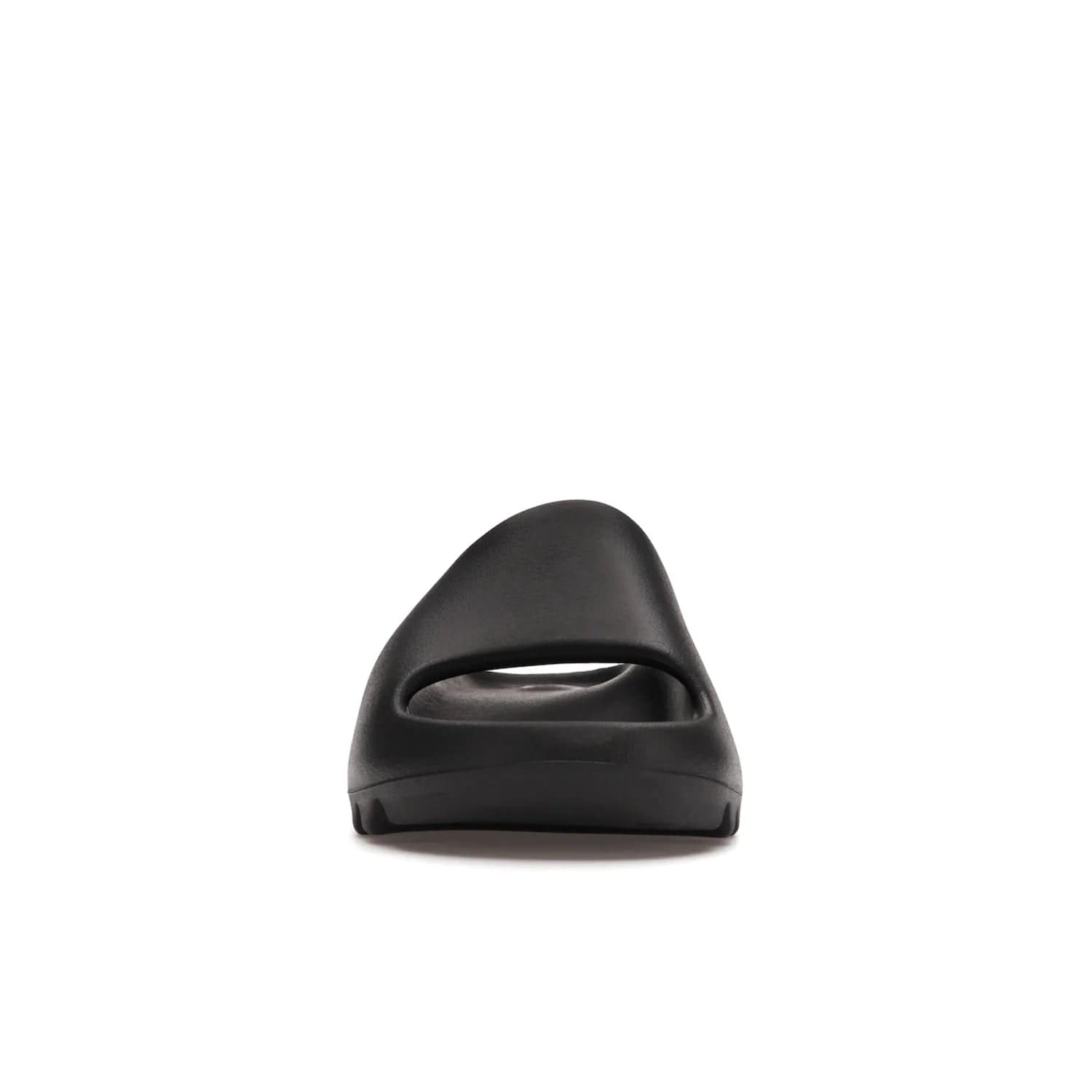 adidas Yeezy Slide Onyx - Image 10 - Only at www.BallersClubKickz.com - Step into comfort and style with the adidas Yeezy Slide Onyx. Featuring foam construction, an all-black colorway and a grooved outsole for stability and responsiveness, this versatile slide is a must-have for your collection.