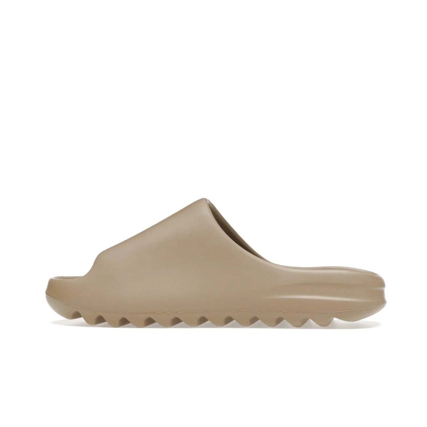 adidas Yeezy Slide Pure (First Release) - Image 20 - Only at www.BallersClubKickz.com - Shop the new adidas Yeezy Slide Pure at adidas. Crafted with a Pure EVA foam upper and soft footbed for instant comfort. Outsole with grooves offers traction & support for a perfect summer look. Available in Pure/Pure/Pure.