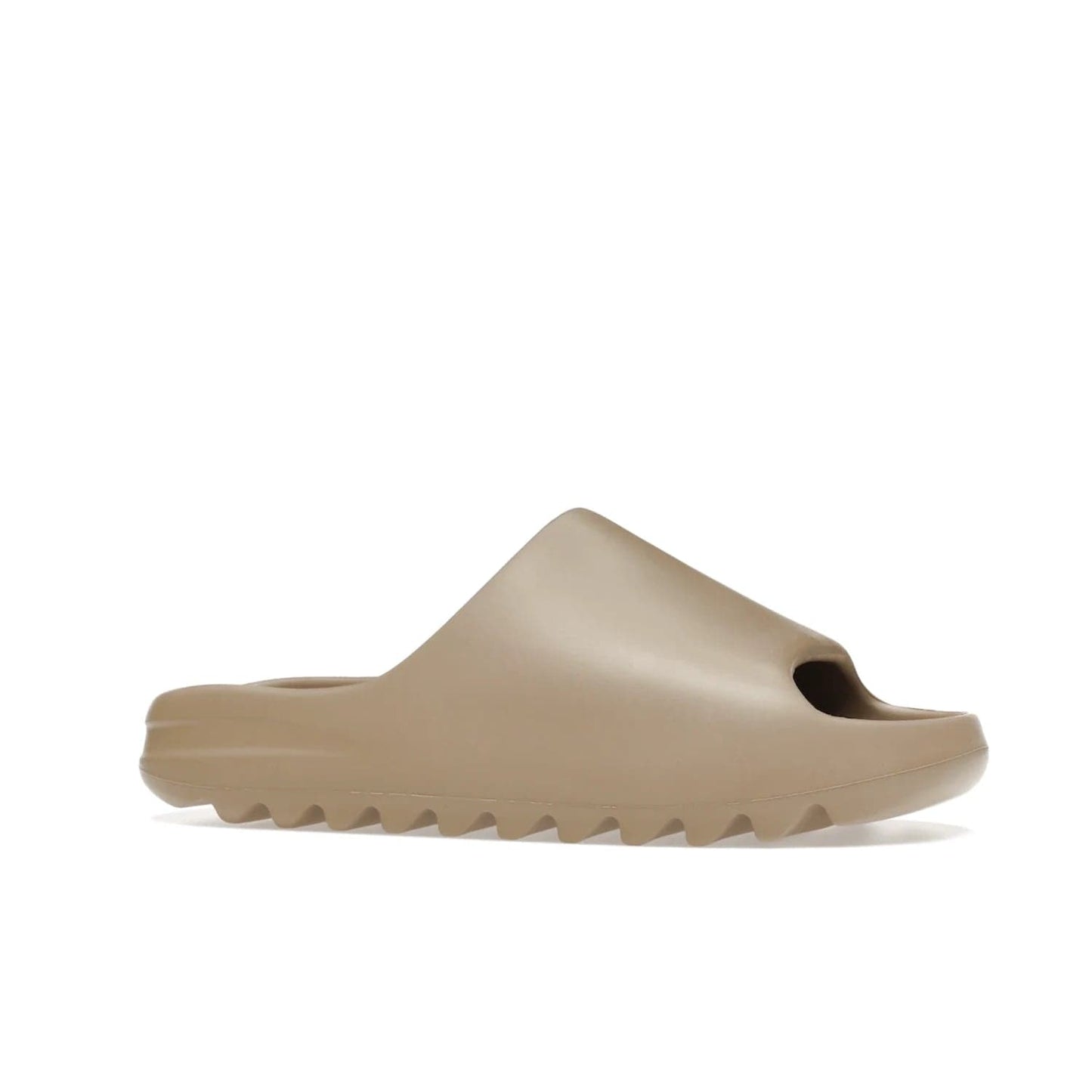 adidas Yeezy Slide Pure (First Release) - Image 3 - Only at www.BallersClubKickz.com - Shop the new adidas Yeezy Slide Pure at adidas. Crafted with a Pure EVA foam upper and soft footbed for instant comfort. Outsole with grooves offers traction & support for a perfect summer look. Available in Pure/Pure/Pure.
