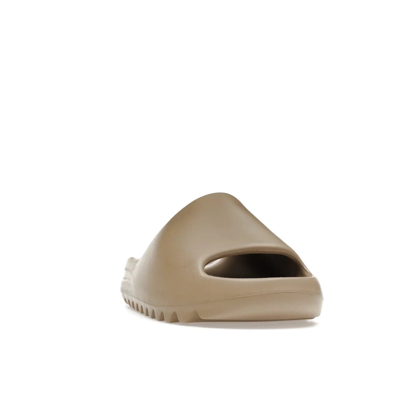 adidas Yeezy Slide Pure (First Release) - Image 8 - Only at www.BallersClubKickz.com - Shop the new adidas Yeezy Slide Pure at adidas. Crafted with a Pure EVA foam upper and soft footbed for instant comfort. Outsole with grooves offers traction & support for a perfect summer look. Available in Pure/Pure/Pure.