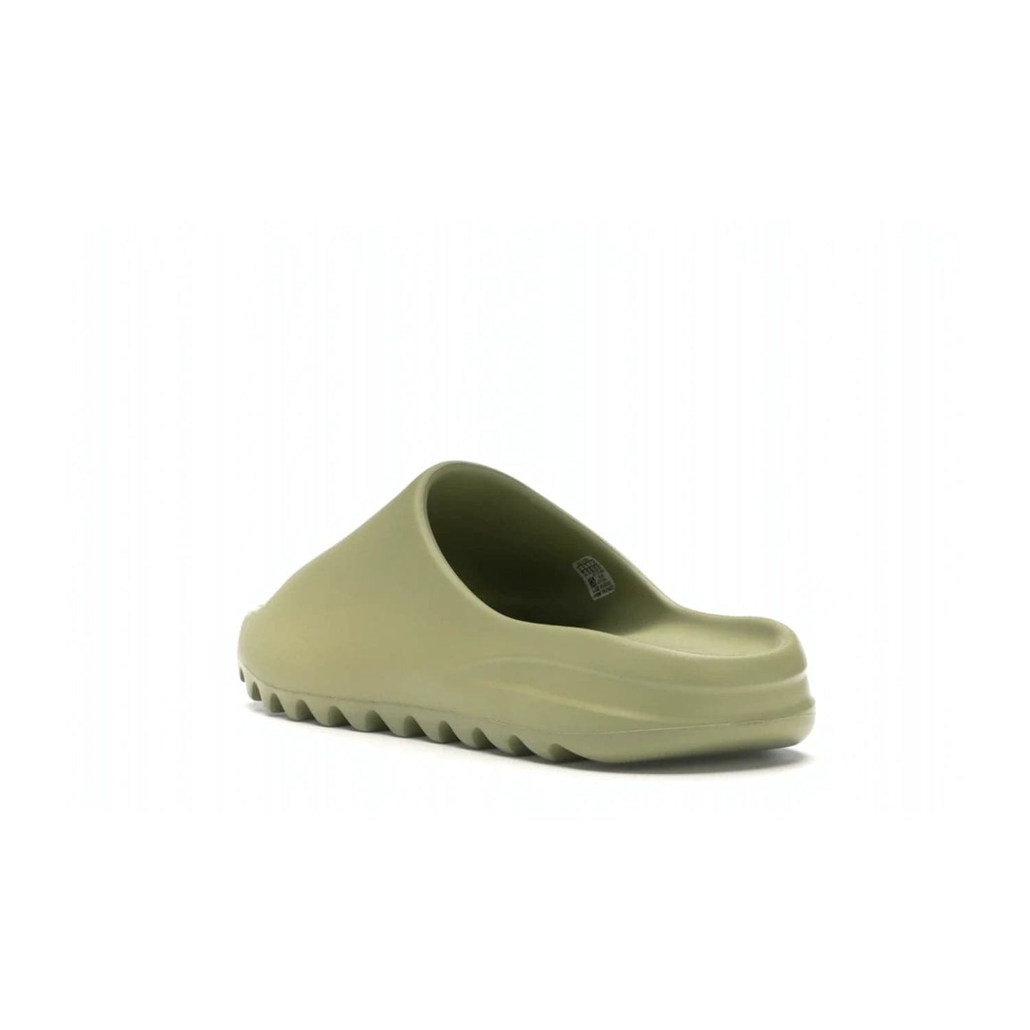 adidas Yeezy Slide Resin (2019/2021) - Image 25 - Only at www.BallersClubKickz.com - Step into fashion and function with the adidas Yeezy Slide Resin. Featuring a lightweight Resin EVA foam construction and an outsole with accentuated grooves for traction and support. The latest release is available in a Resin/Resin/Resin colorway, combining modern aesthetics and classic style. Step into style with the adidas Yeezy Slide Resin and be the trend-setter this season.