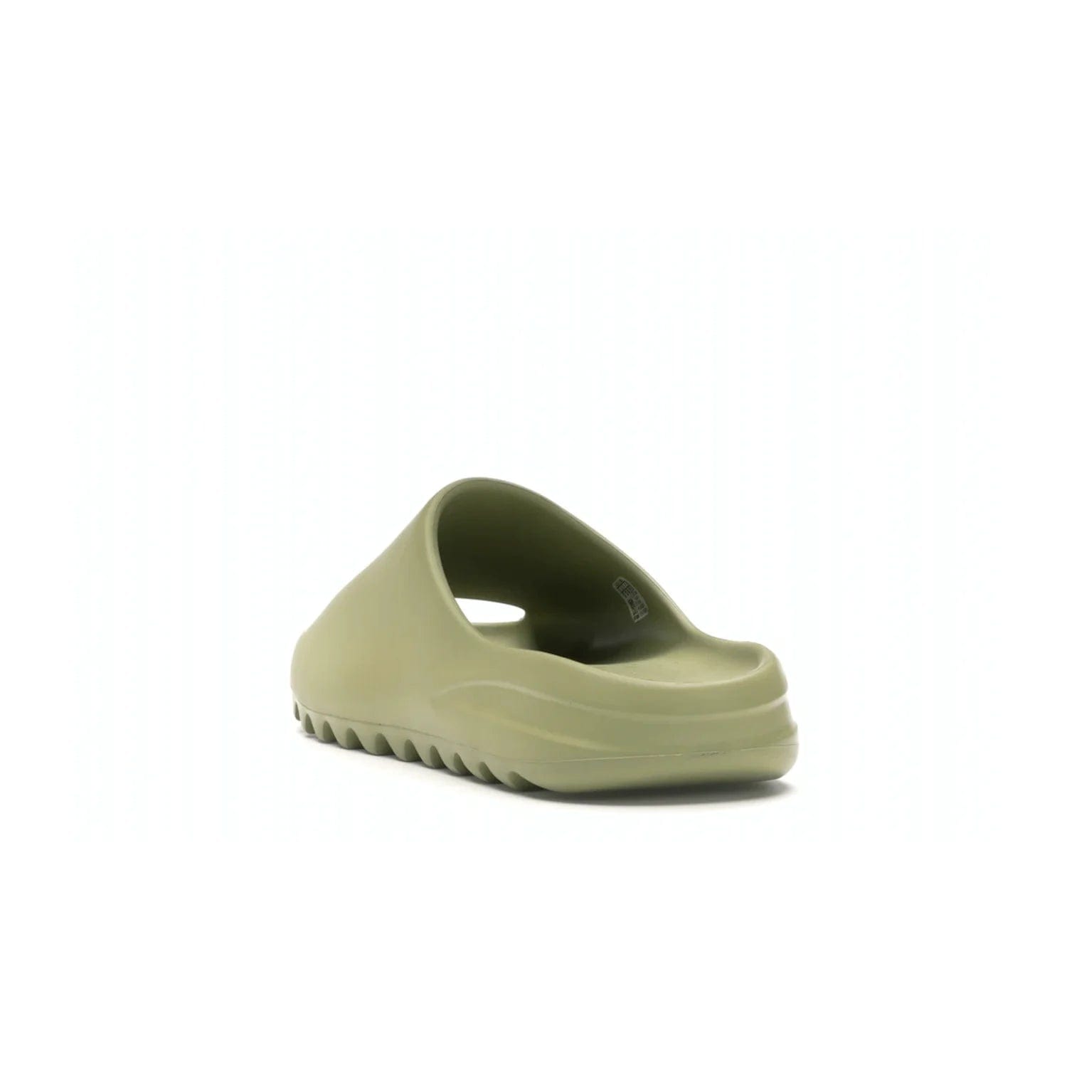 adidas Yeezy Slide Resin (2019/2021) - Image 26 - Only at www.BallersClubKickz.com - Step into fashion and function with the adidas Yeezy Slide Resin. Featuring a lightweight Resin EVA foam construction and an outsole with accentuated grooves for traction and support. The latest release is available in a Resin/Resin/Resin colorway, combining modern aesthetics and classic style. Step into style with the adidas Yeezy Slide Resin and be the trend-setter this season.