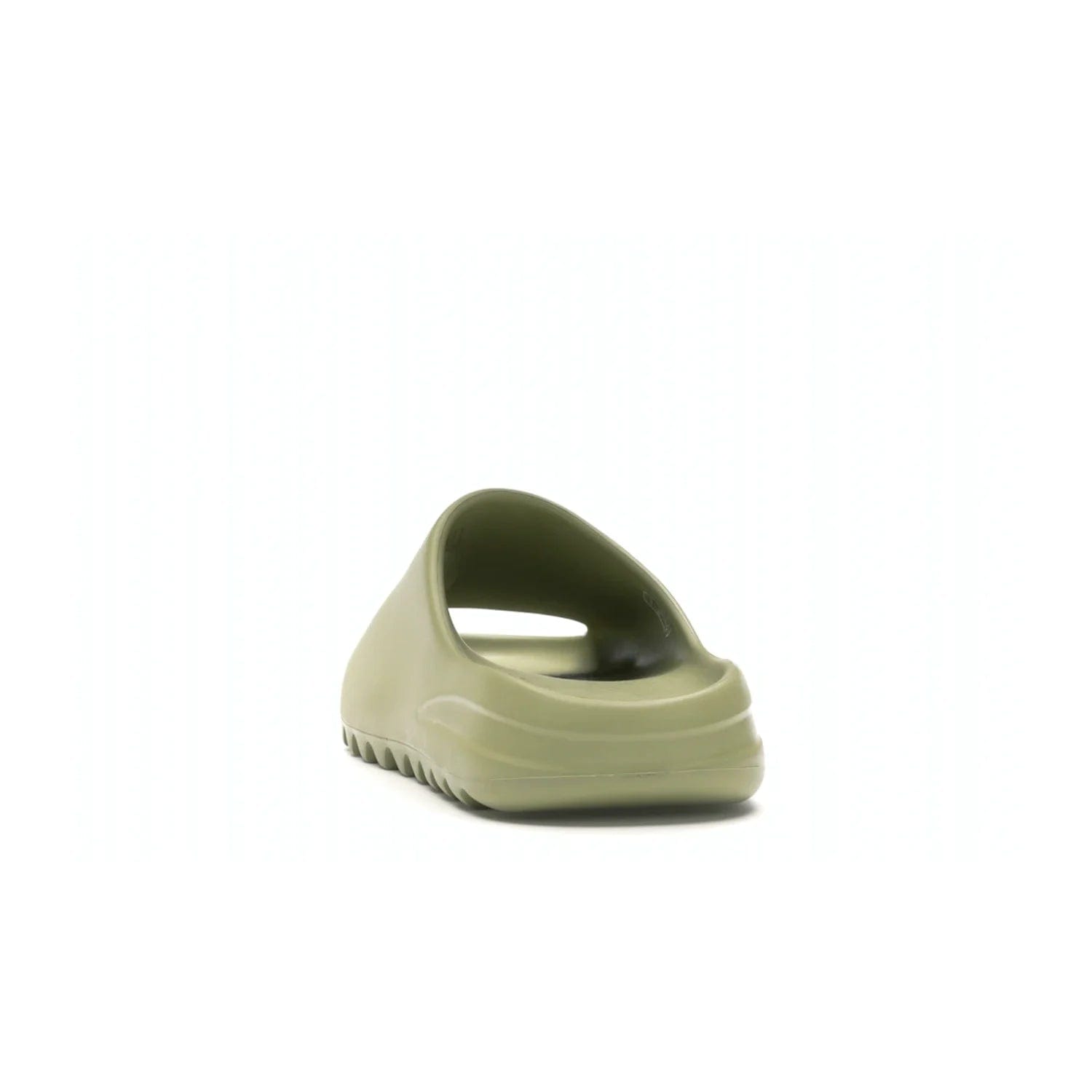 adidas Yeezy Slide Resin (2019/2021) - Image 27 - Only at www.BallersClubKickz.com - Step into fashion and function with the adidas Yeezy Slide Resin. Featuring a lightweight Resin EVA foam construction and an outsole with accentuated grooves for traction and support. The latest release is available in a Resin/Resin/Resin colorway, combining modern aesthetics and classic style. Step into style with the adidas Yeezy Slide Resin and be the trend-setter this season.