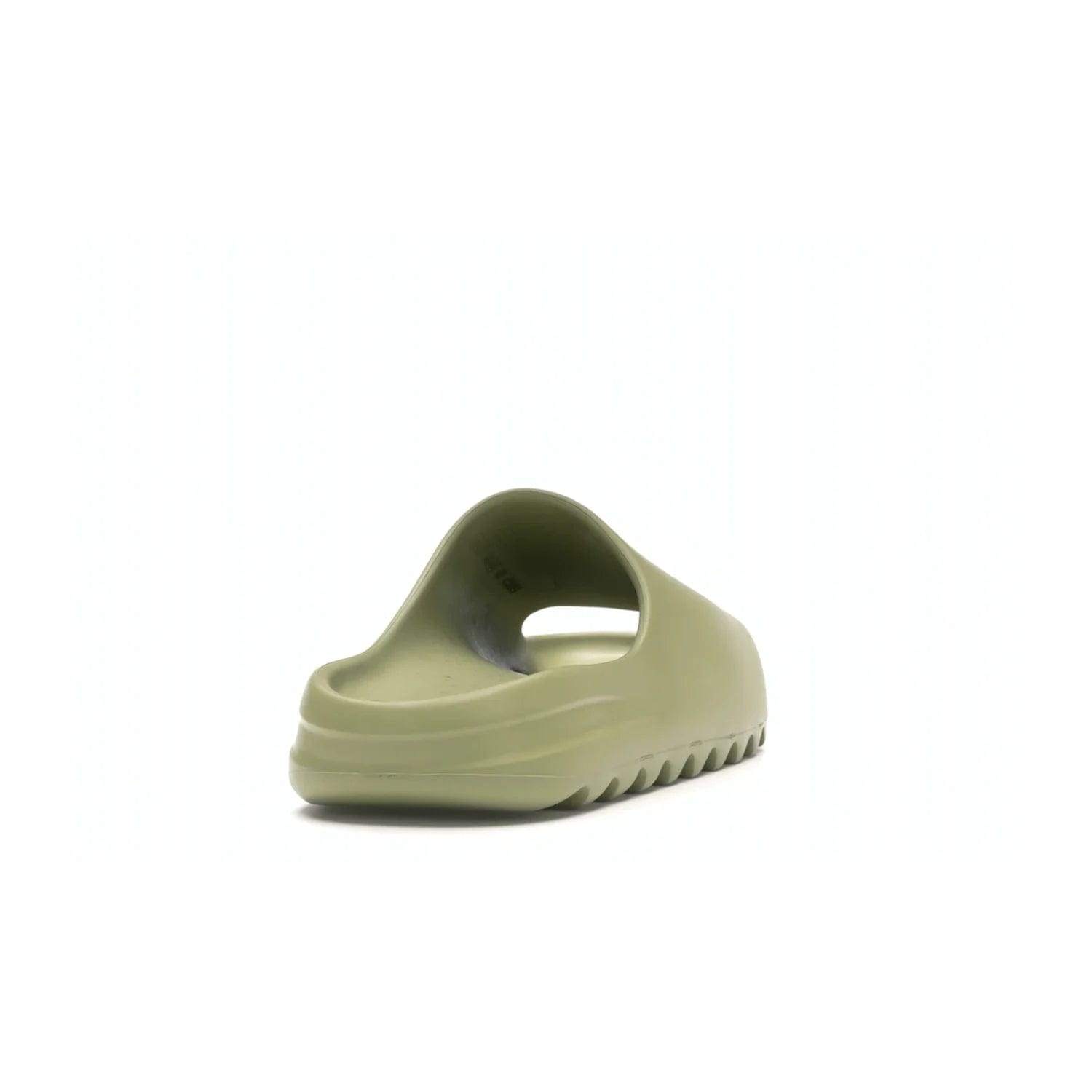 adidas Yeezy Slide Resin (2019/2021) - Image 30 - Only at www.BallersClubKickz.com - Step into fashion and function with the adidas Yeezy Slide Resin. Featuring a lightweight Resin EVA foam construction and an outsole with accentuated grooves for traction and support. The latest release is available in a Resin/Resin/Resin colorway, combining modern aesthetics and classic style. Step into style with the adidas Yeezy Slide Resin and be the trend-setter this season.