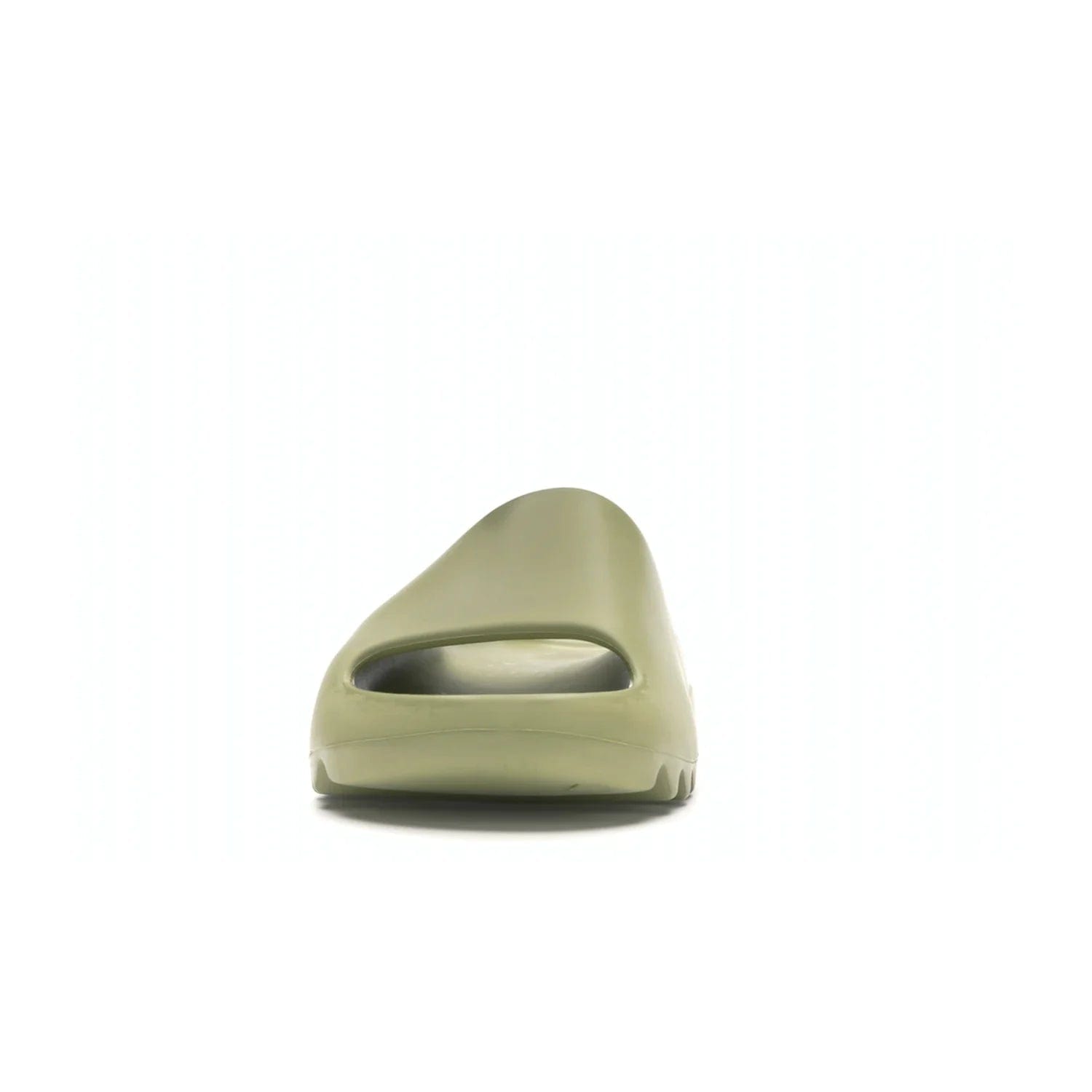 adidas Yeezy Slide Resin (2019/2021) - Image 11 - Only at www.BallersClubKickz.com - Step into fashion and function with the adidas Yeezy Slide Resin. Featuring a lightweight Resin EVA foam construction and an outsole with accentuated grooves for traction and support. The latest release is available in a Resin/Resin/Resin colorway, combining modern aesthetics and classic style. Step into style with the adidas Yeezy Slide Resin and be the trend-setter this season.