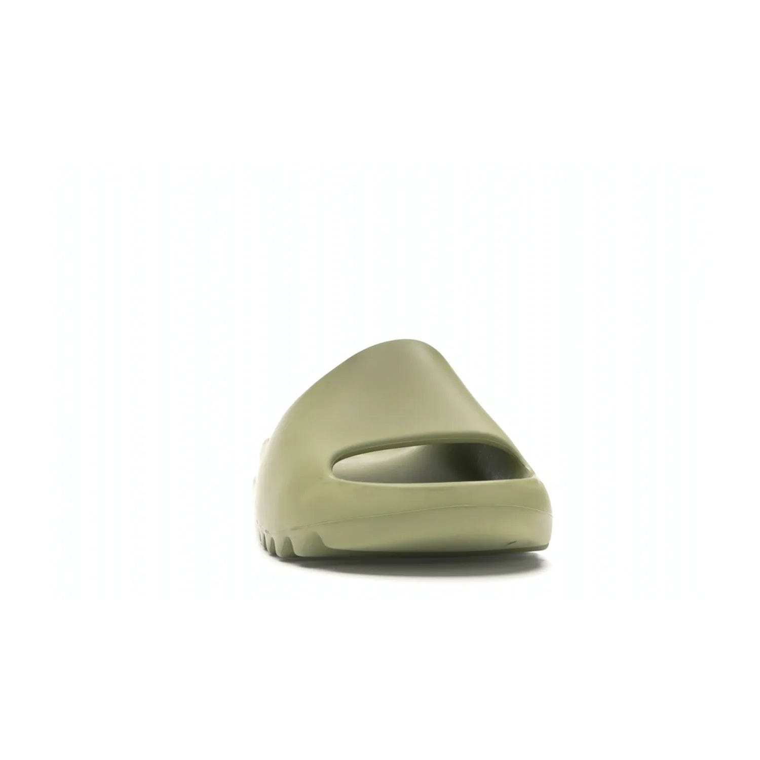 adidas Yeezy Slide Resin (2019/2021) - Image 9 - Only at www.BallersClubKickz.com - Step into fashion and function with the adidas Yeezy Slide Resin. Featuring a lightweight Resin EVA foam construction and an outsole with accentuated grooves for traction and support. The latest release is available in a Resin/Resin/Resin colorway, combining modern aesthetics and classic style. Step into style with the adidas Yeezy Slide Resin and be the trend-setter this season.
