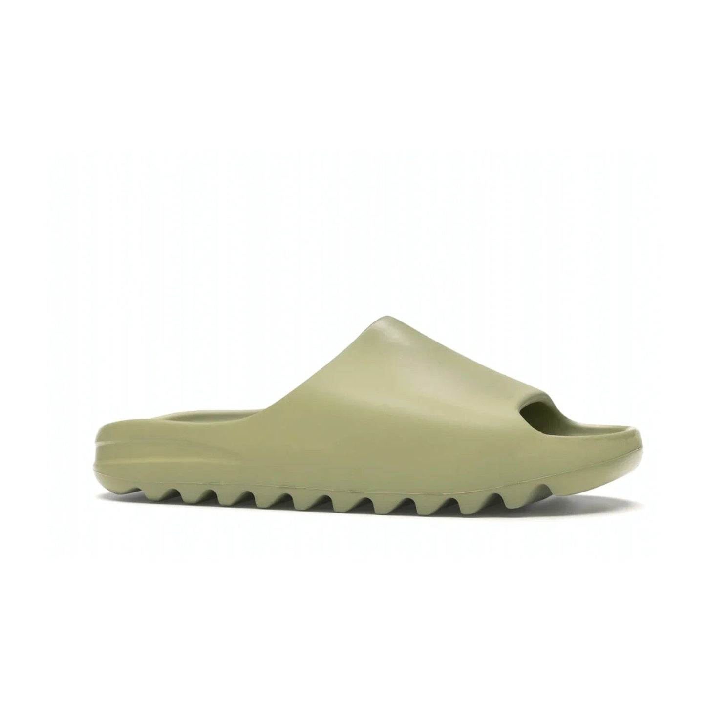 adidas Yeezy Slide Resin (2019/2021) - Image 3 - Only at www.BallersClubKickz.com - Step into fashion and function with the adidas Yeezy Slide Resin. Featuring a lightweight Resin EVA foam construction and an outsole with accentuated grooves for traction and support. The latest release is available in a Resin/Resin/Resin colorway, combining modern aesthetics and classic style. Step into style with the adidas Yeezy Slide Resin and be the trend-setter this season.