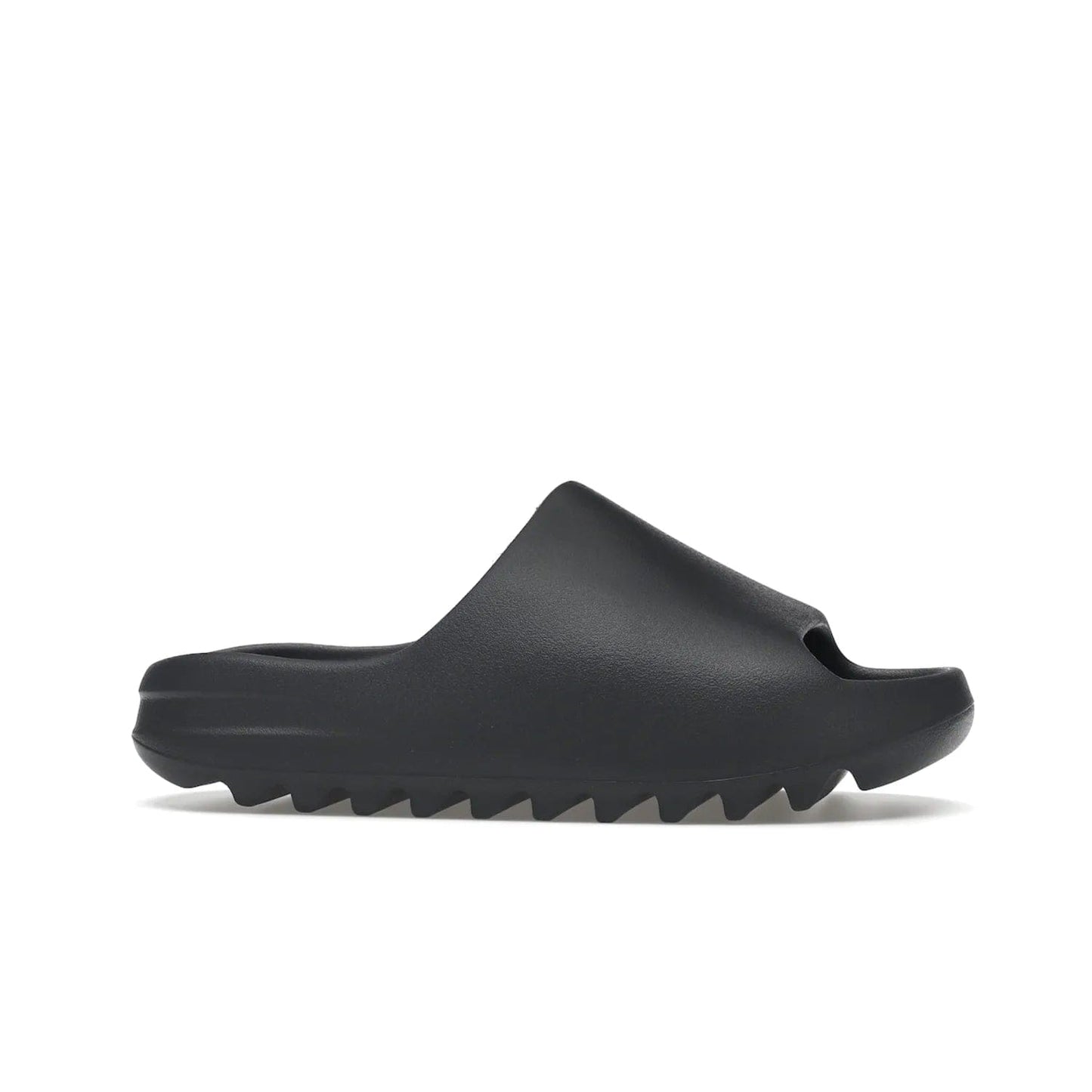 adidas Yeezy Slide Slate Grey - Image 2 - Only at www.BallersClubKickz.com - Stylish & comfortable adidas Yeezy Slide Slate Grey features an EVA foam upper, strategic cutouts, textured outsole pattern, & easy slip-on design for modern comfort & classic style.