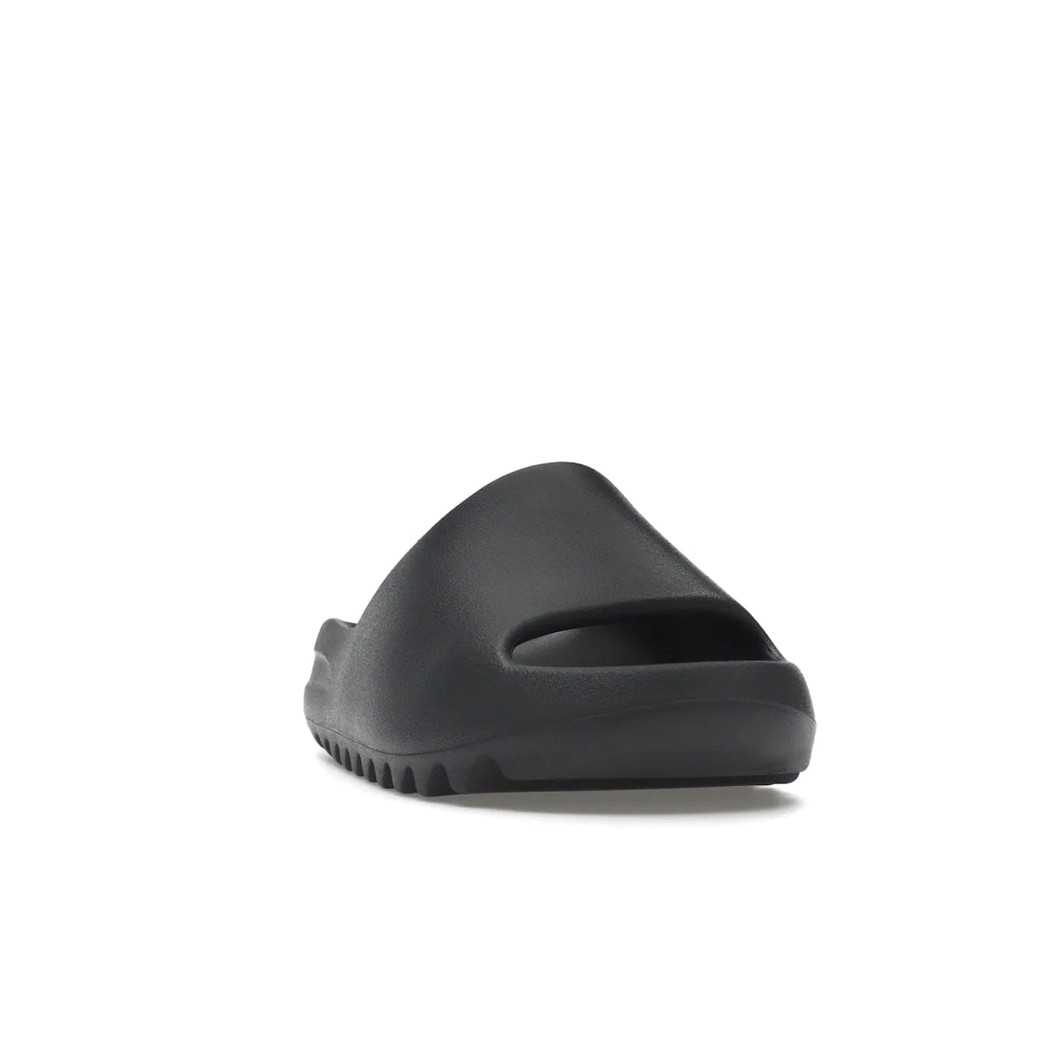 adidas Yeezy Slide Slate Grey - Image 8 - Only at www.BallersClubKickz.com - Stylish & comfortable adidas Yeezy Slide Slate Grey features an EVA foam upper, strategic cutouts, textured outsole pattern, & easy slip-on design for modern comfort & classic style.