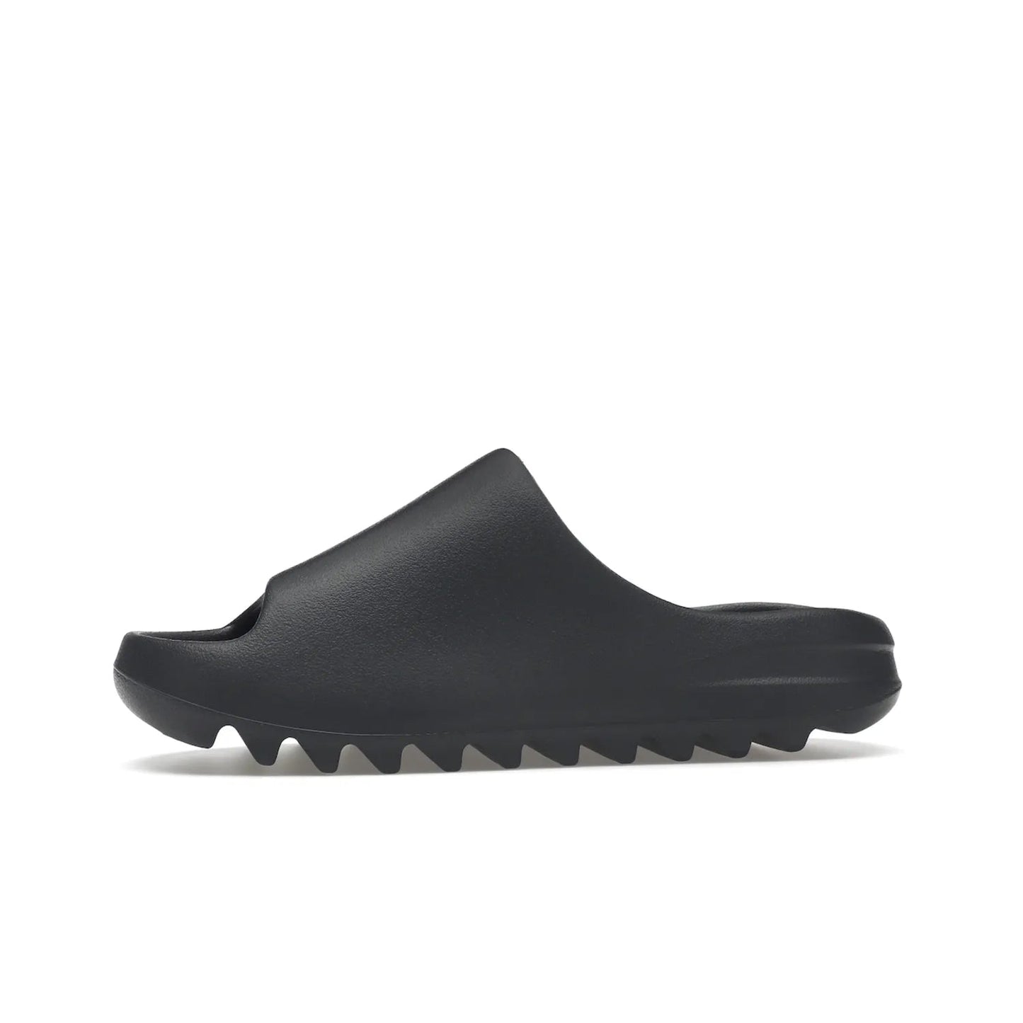 adidas Yeezy Slide Slate Grey - Image 18 - Only at www.BallersClubKickz.com - Stylish & comfortable adidas Yeezy Slide Slate Grey features an EVA foam upper, strategic cutouts, textured outsole pattern, & easy slip-on design for modern comfort & classic style.