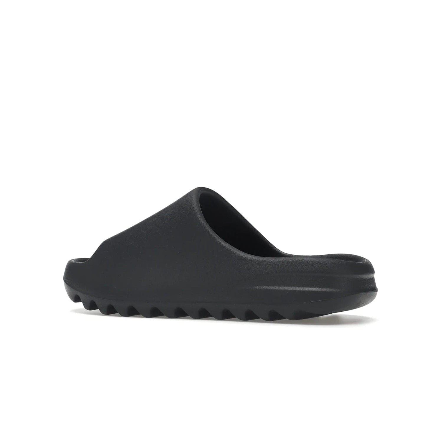adidas Yeezy Slide Slate Grey - Image 22 - Only at www.BallersClubKickz.com - Stylish & comfortable adidas Yeezy Slide Slate Grey features an EVA foam upper, strategic cutouts, textured outsole pattern, & easy slip-on design for modern comfort & classic style.