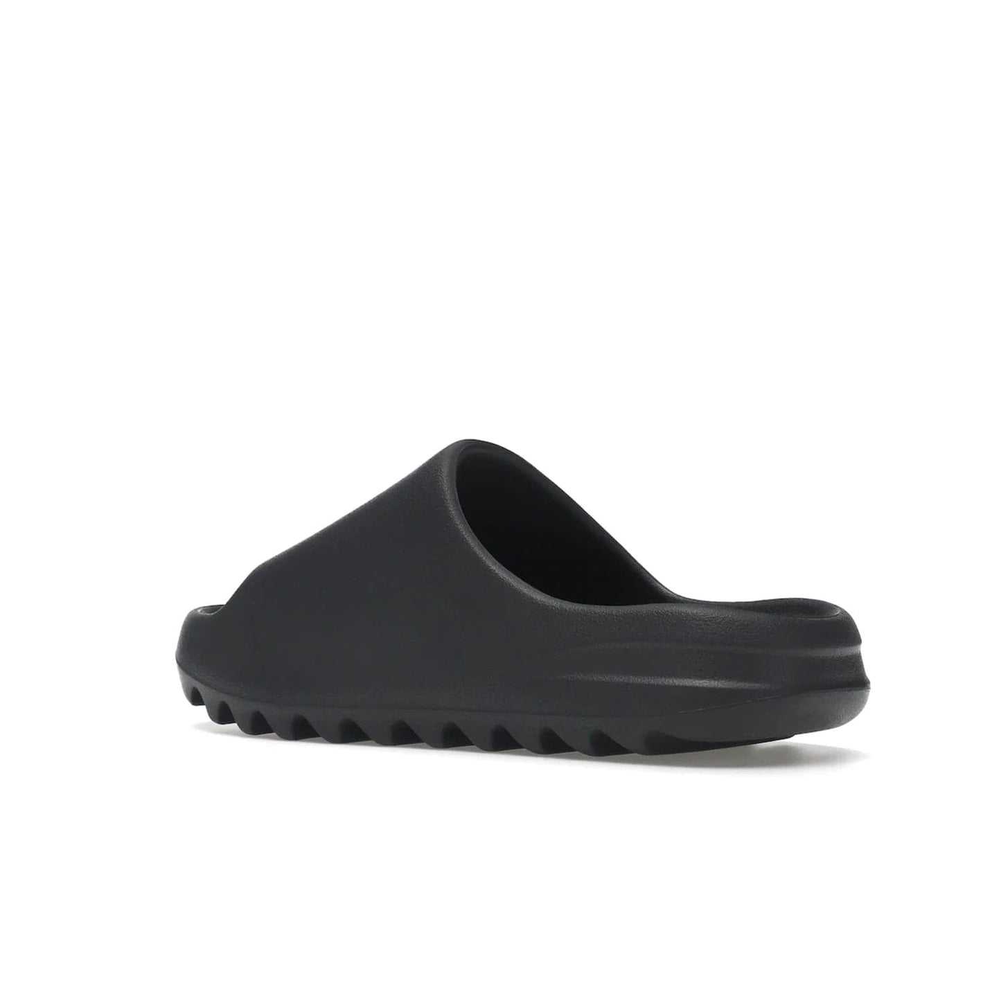 adidas Yeezy Slide Slate Grey - Image 23 - Only at www.BallersClubKickz.com - Stylish & comfortable adidas Yeezy Slide Slate Grey features an EVA foam upper, strategic cutouts, textured outsole pattern, & easy slip-on design for modern comfort & classic style.