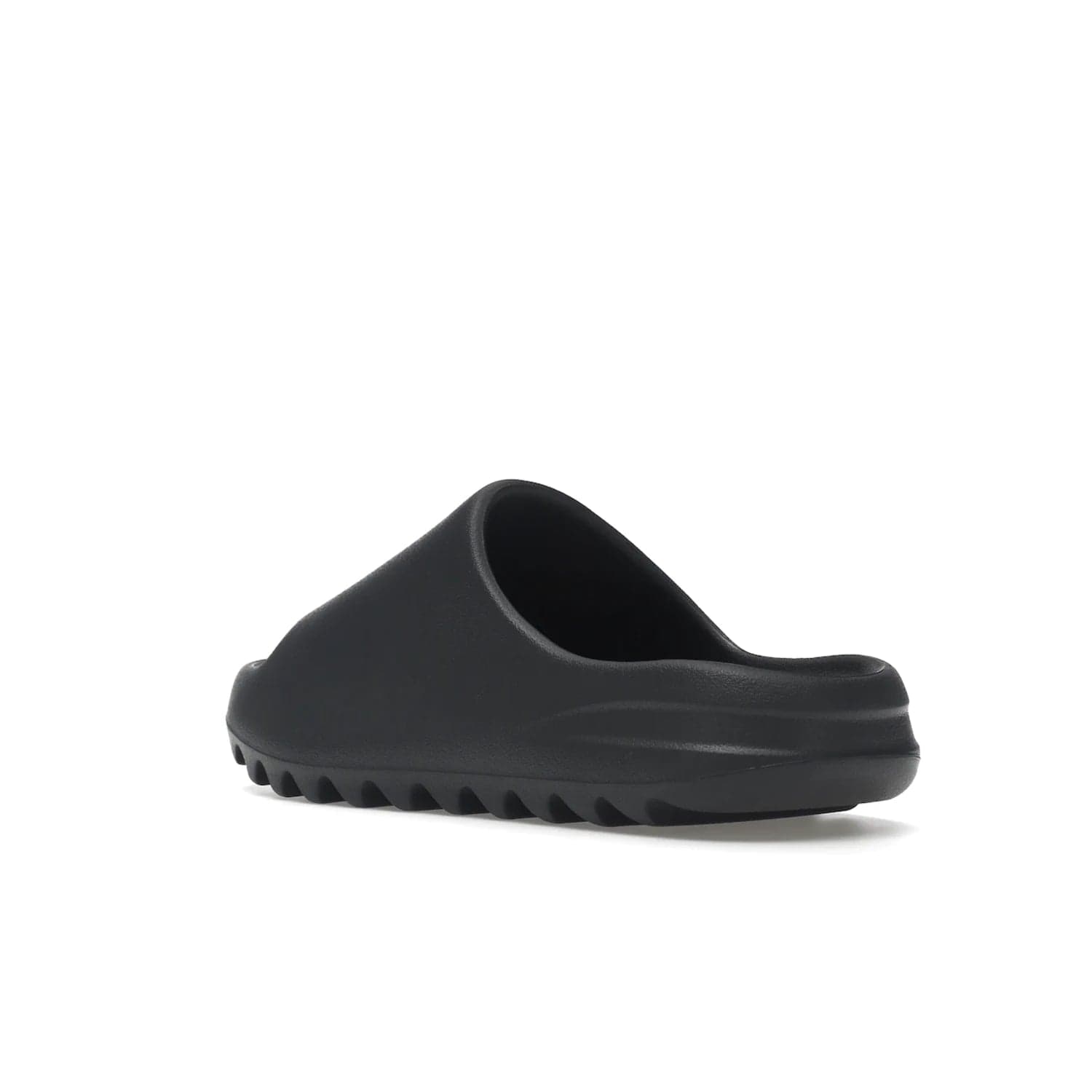 adidas Yeezy Slide Slate Grey - Image 24 - Only at www.BallersClubKickz.com - Stylish & comfortable adidas Yeezy Slide Slate Grey features an EVA foam upper, strategic cutouts, textured outsole pattern, & easy slip-on design for modern comfort & classic style.