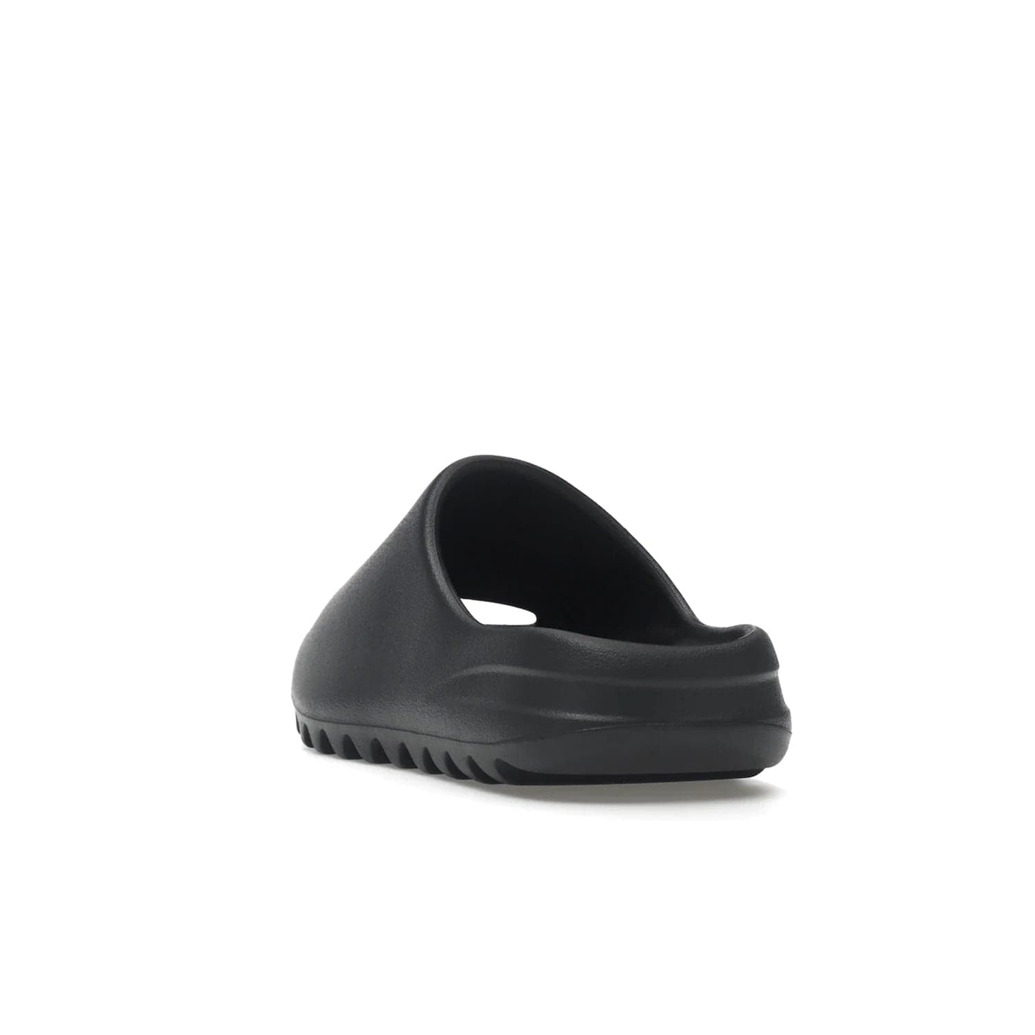 adidas Yeezy Slide Slate Grey - Image 26 - Only at www.BallersClubKickz.com - Stylish & comfortable adidas Yeezy Slide Slate Grey features an EVA foam upper, strategic cutouts, textured outsole pattern, & easy slip-on design for modern comfort & classic style.