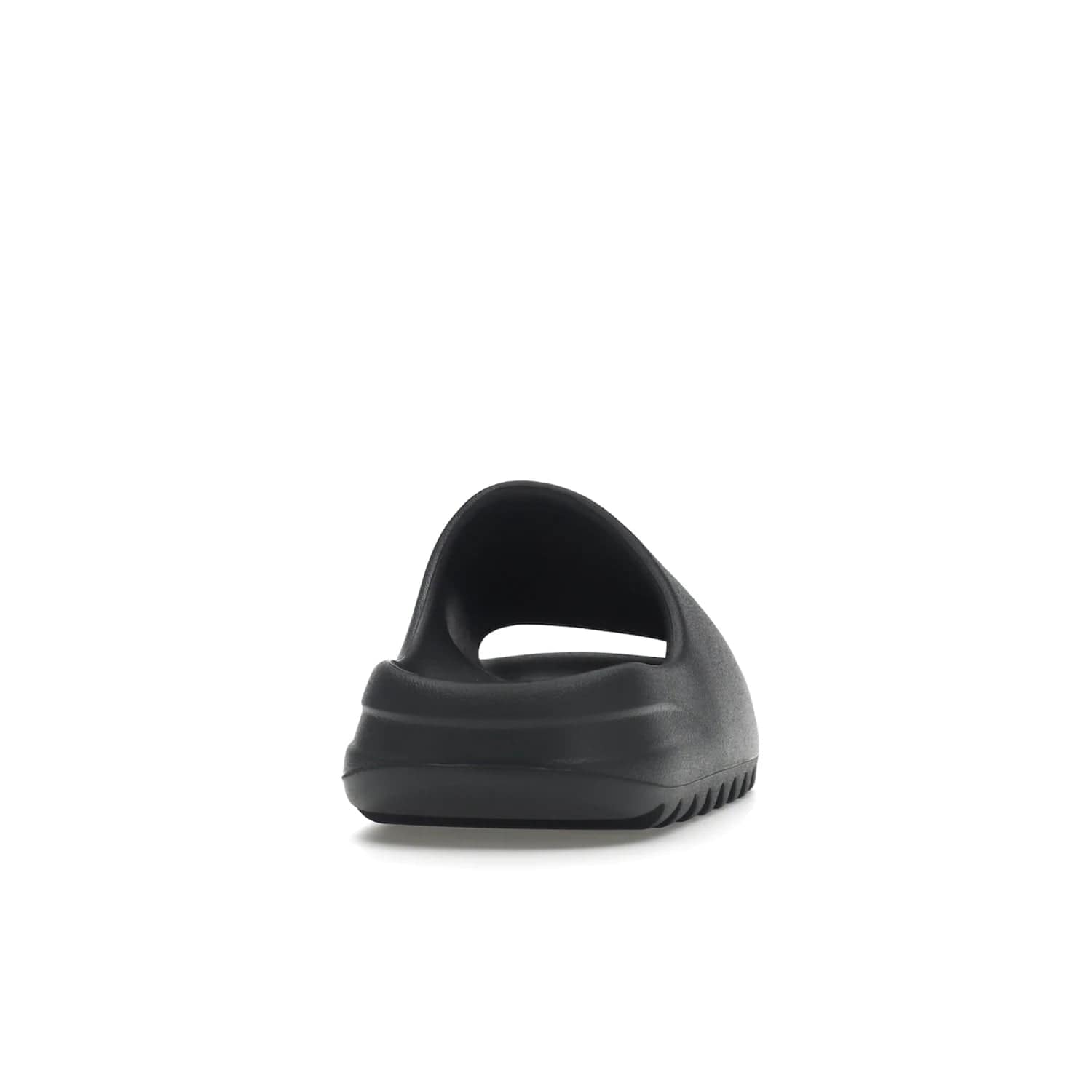 adidas Yeezy Slide Slate Grey - Image 29 - Only at www.BallersClubKickz.com - Stylish & comfortable adidas Yeezy Slide Slate Grey features an EVA foam upper, strategic cutouts, textured outsole pattern, & easy slip-on design for modern comfort & classic style.