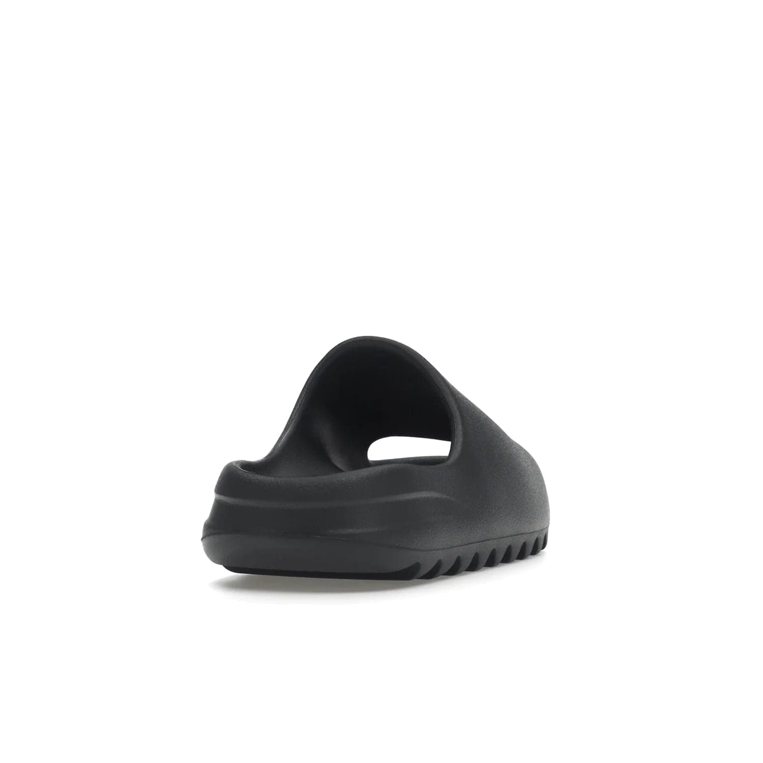 adidas Yeezy Slide Slate Grey - Image 30 - Only at www.BallersClubKickz.com - Stylish & comfortable adidas Yeezy Slide Slate Grey features an EVA foam upper, strategic cutouts, textured outsole pattern, & easy slip-on design for modern comfort & classic style.