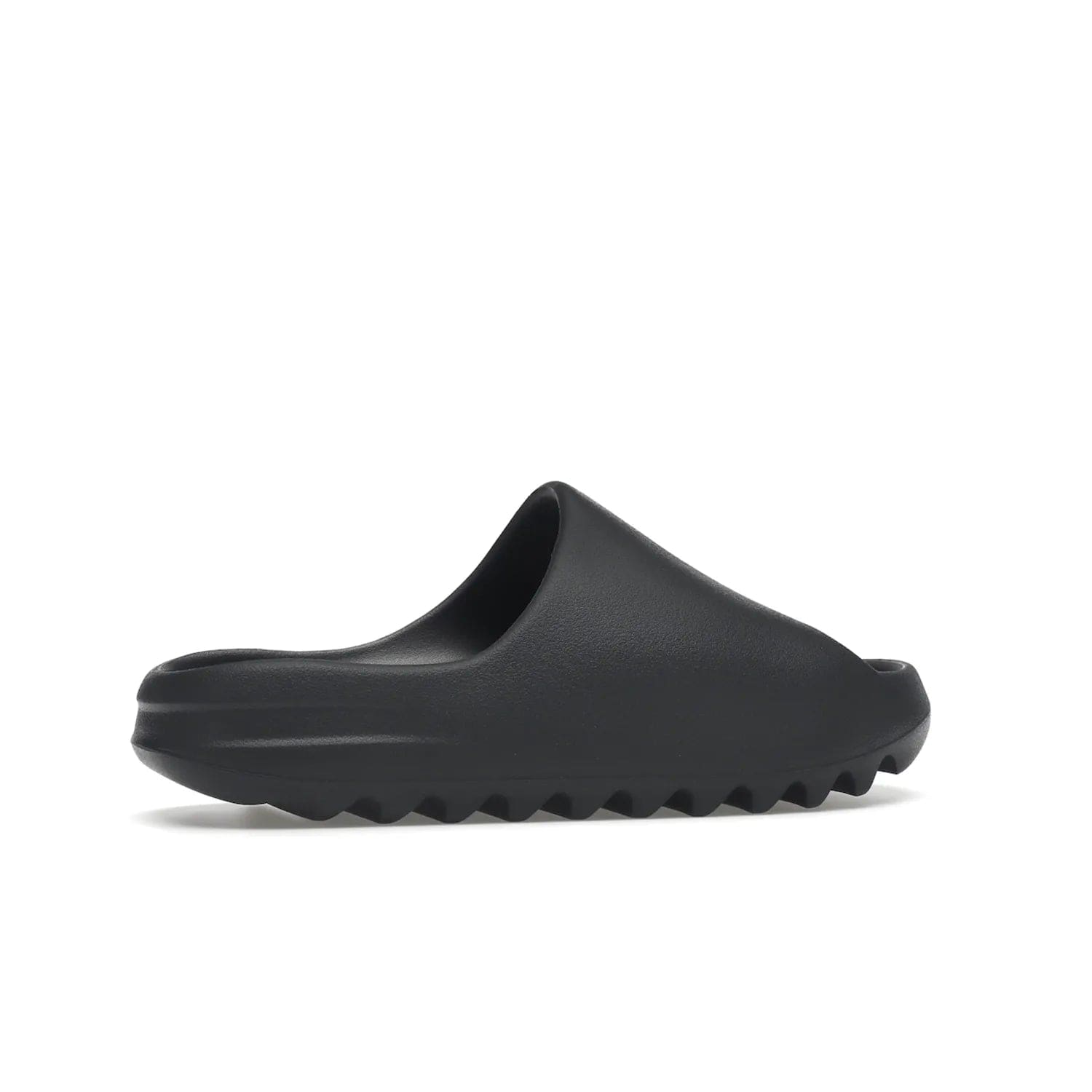 adidas Yeezy Slide Slate Grey - Image 35 - Only at www.BallersClubKickz.com - Stylish & comfortable adidas Yeezy Slide Slate Grey features an EVA foam upper, strategic cutouts, textured outsole pattern, & easy slip-on design for modern comfort & classic style.