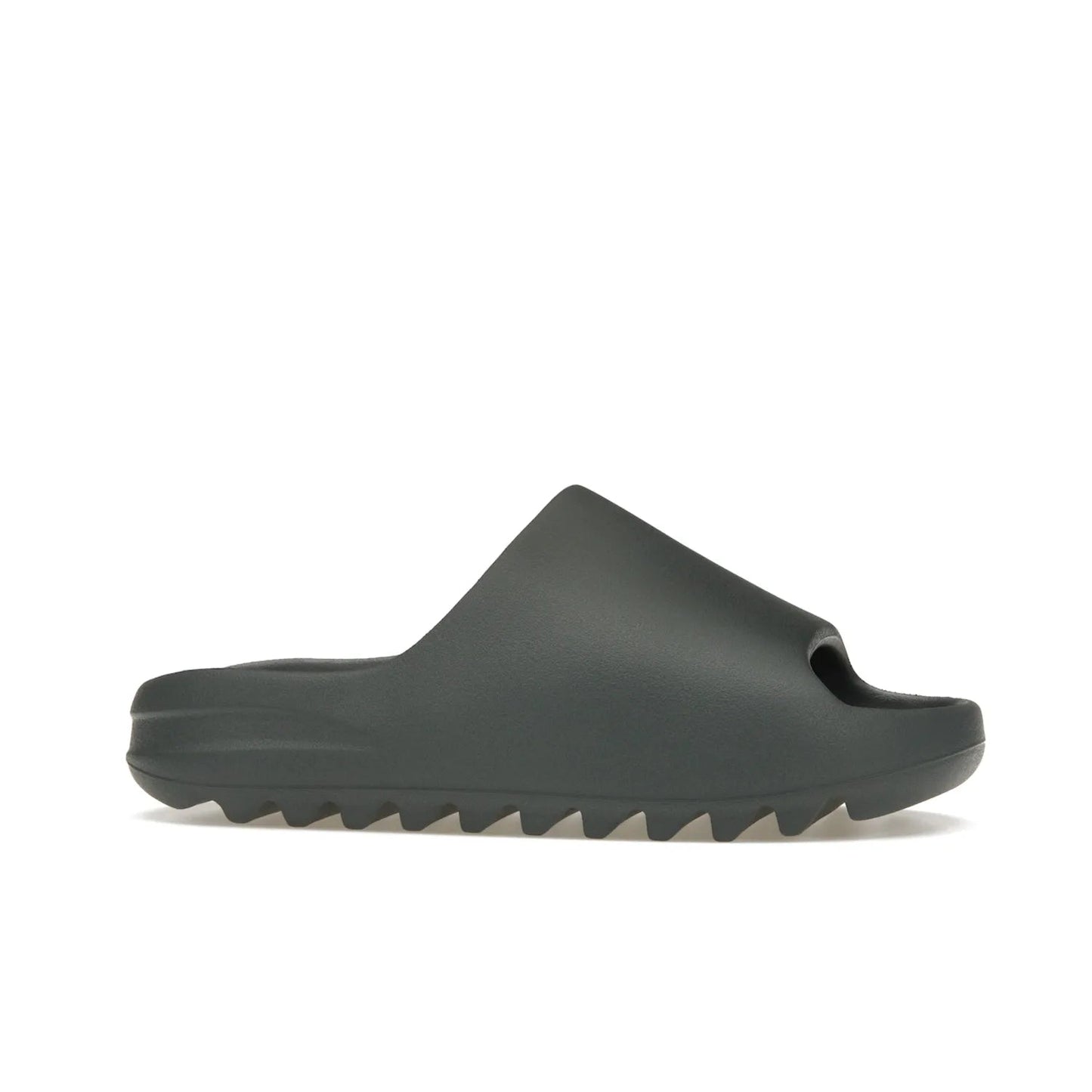 adidas Yeezy Slide Slate Marine - Image 2 - Only at www.BallersClubKickz.com - Discover the Adidas Yeezy Slide Slate Marine. With a Slate Marine colorway, contrasting outsole, and matching strap, these sandals make a timeless fashion statement. Out August 11th, 2023.