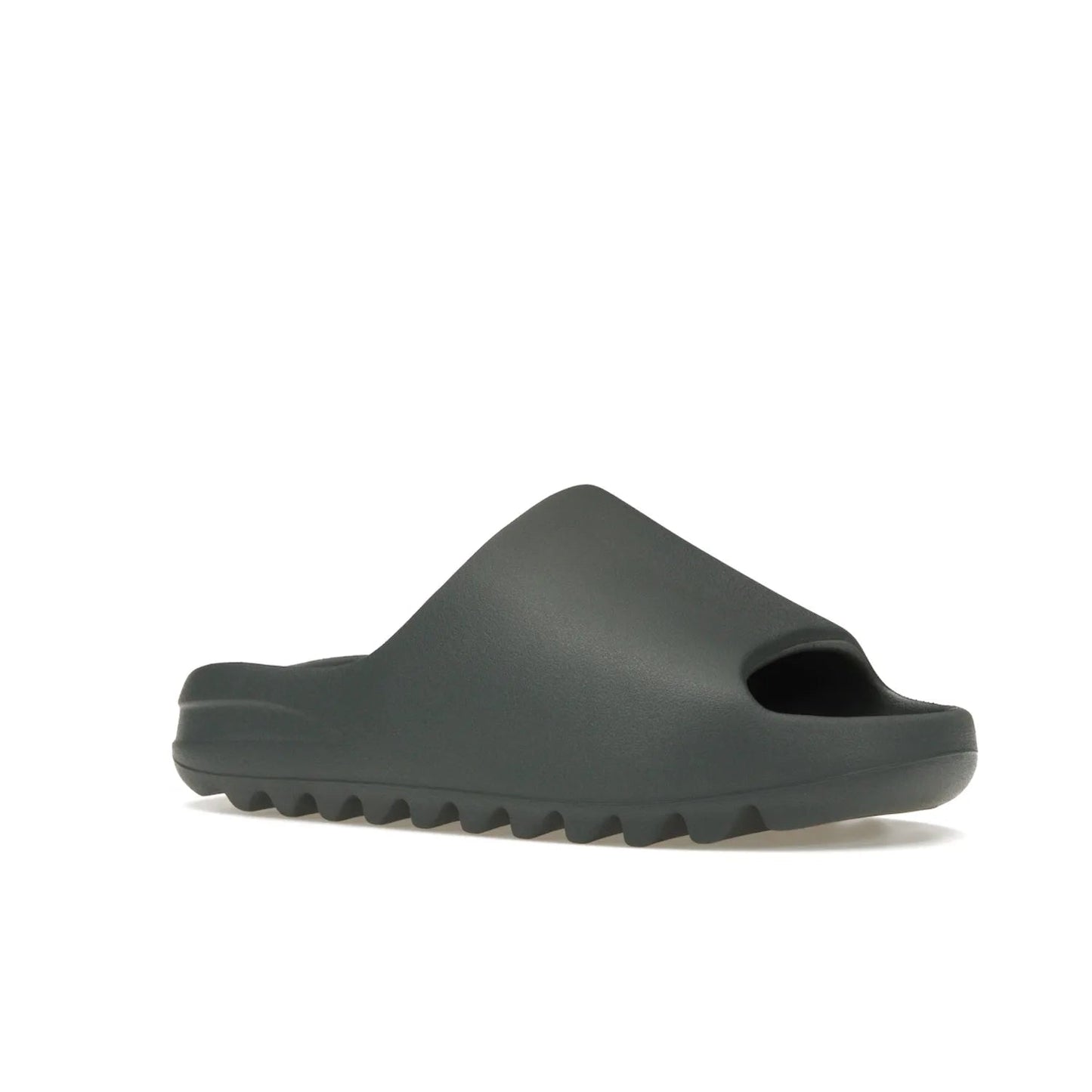 adidas Yeezy Slide Slate Marine - Image 4 - Only at www.BallersClubKickz.com - Discover the Adidas Yeezy Slide Slate Marine. With a Slate Marine colorway, contrasting outsole, and matching strap, these sandals make a timeless fashion statement. Out August 11th, 2023.