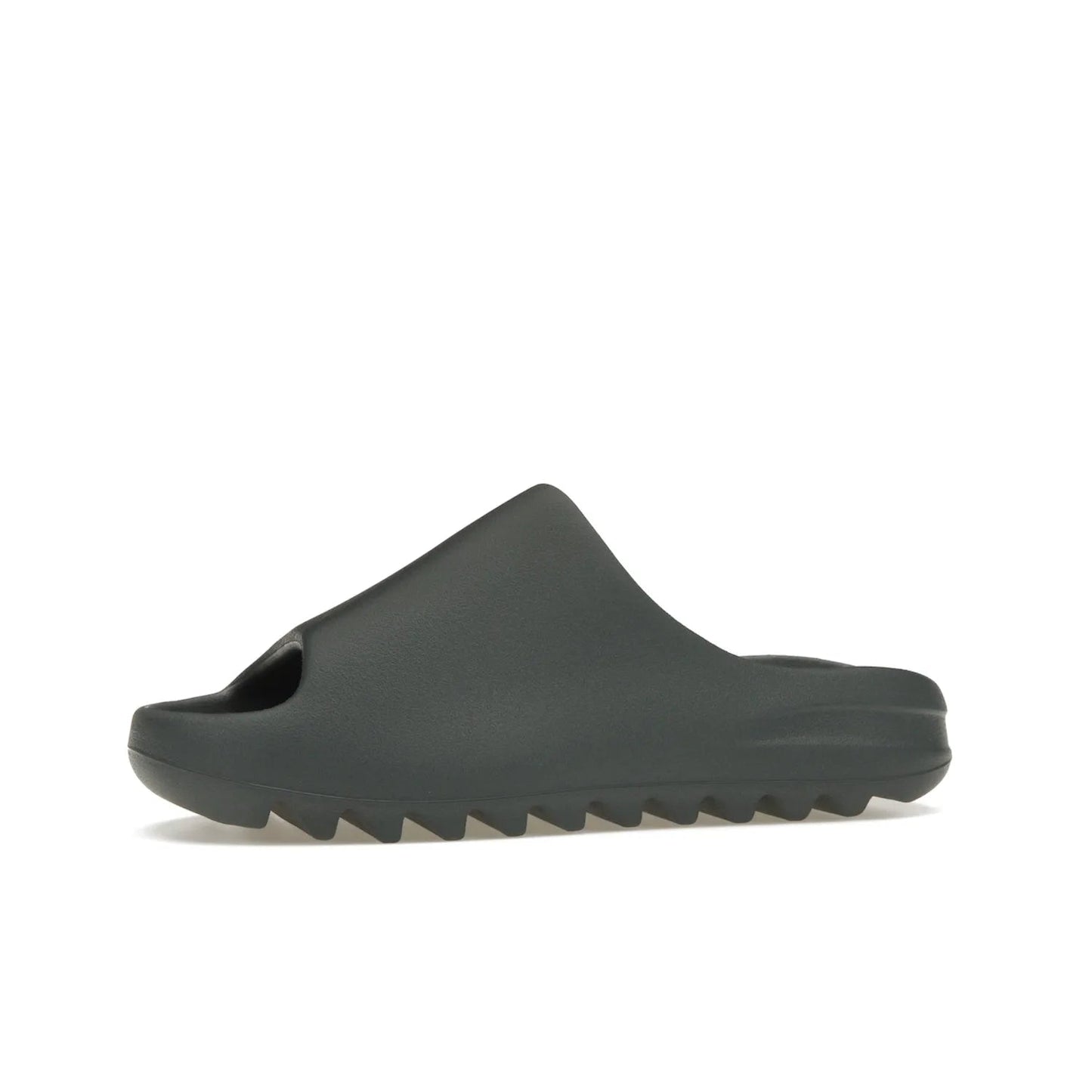 adidas Yeezy Slide Slate Marine - Image 17 - Only at www.BallersClubKickz.com - Discover the Adidas Yeezy Slide Slate Marine. With a Slate Marine colorway, contrasting outsole, and matching strap, these sandals make a timeless fashion statement. Out August 11th, 2023.