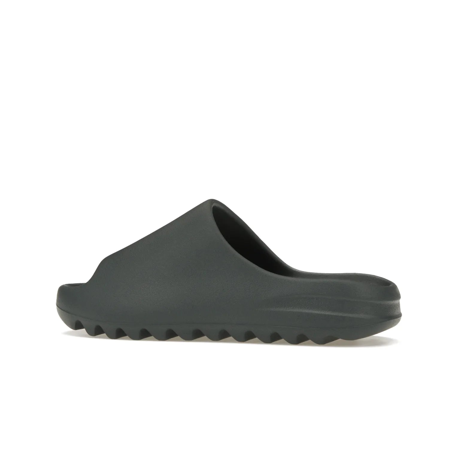adidas Yeezy Slide Slate Marine - Image 21 - Only at www.BallersClubKickz.com - Discover the Adidas Yeezy Slide Slate Marine. With a Slate Marine colorway, contrasting outsole, and matching strap, these sandals make a timeless fashion statement. Out August 11th, 2023.