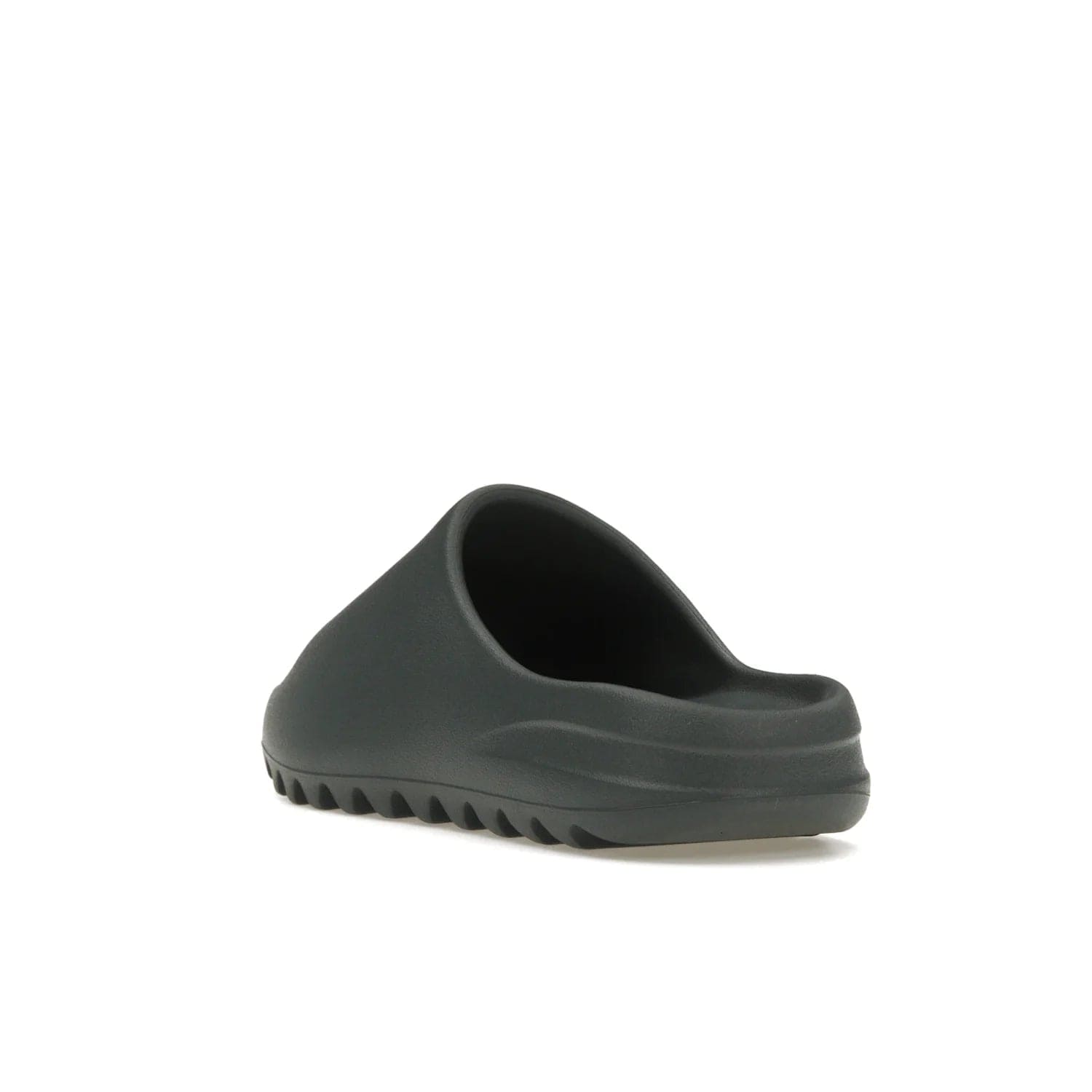 adidas Yeezy Slide Slate Marine - Image 25 - Only at www.BallersClubKickz.com - Discover the Adidas Yeezy Slide Slate Marine. With a Slate Marine colorway, contrasting outsole, and matching strap, these sandals make a timeless fashion statement. Out August 11th, 2023.