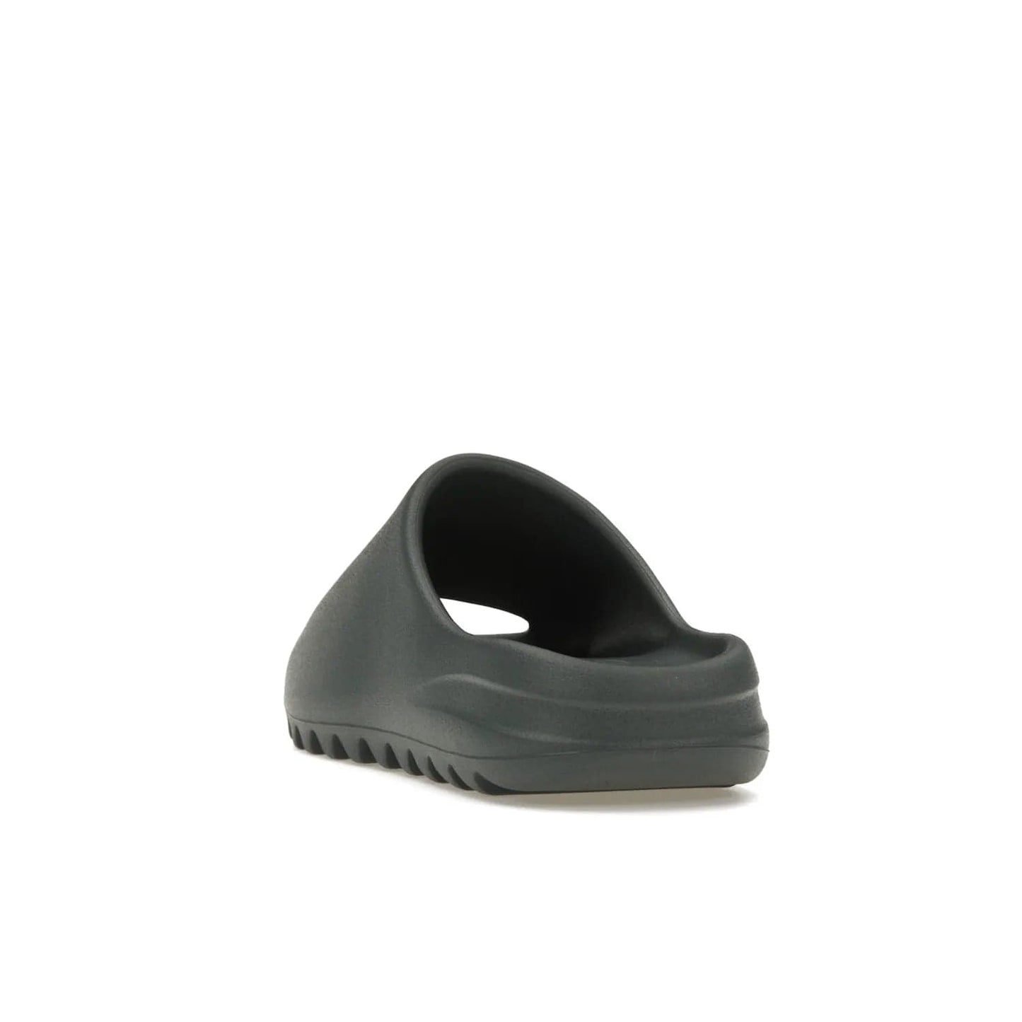adidas Yeezy Slide Slate Marine - Image 26 - Only at www.BallersClubKickz.com - Discover the Adidas Yeezy Slide Slate Marine. With a Slate Marine colorway, contrasting outsole, and matching strap, these sandals make a timeless fashion statement. Out August 11th, 2023.