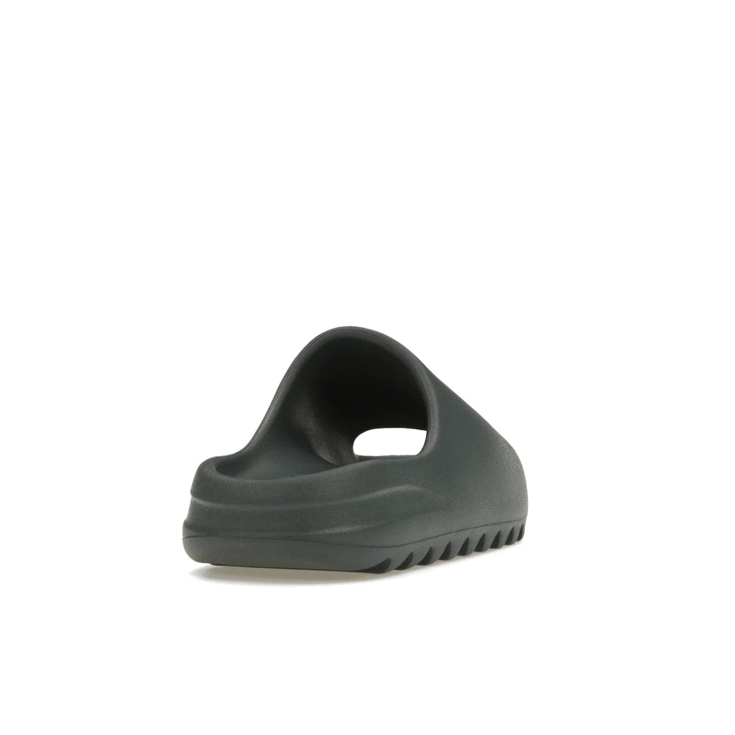 adidas Yeezy Slide Slate Marine - Image 30 - Only at www.BallersClubKickz.com - Discover the Adidas Yeezy Slide Slate Marine. With a Slate Marine colorway, contrasting outsole, and matching strap, these sandals make a timeless fashion statement. Out August 11th, 2023.