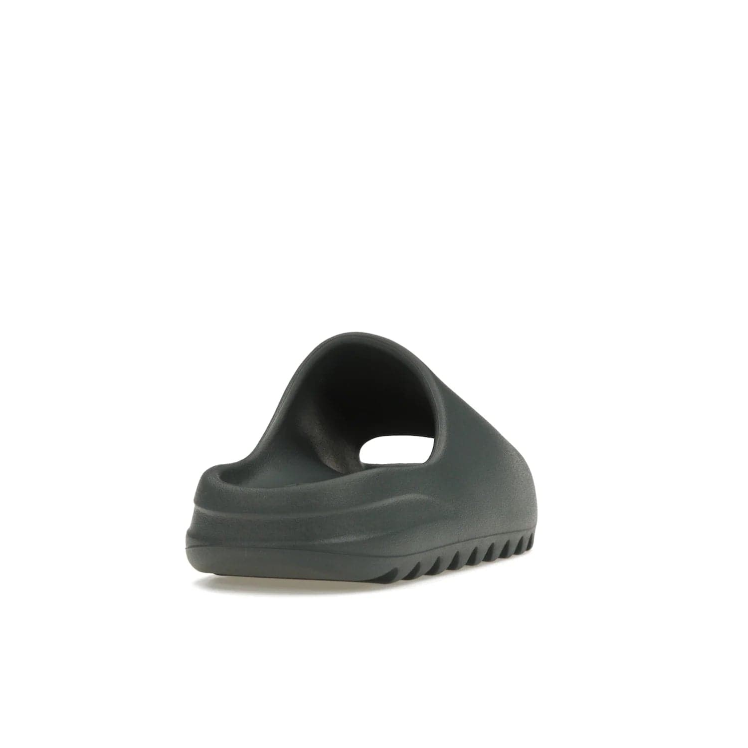 adidas Yeezy Slide Slate Marine - Image 30 - Only at www.BallersClubKickz.com - Discover the Adidas Yeezy Slide Slate Marine. With a Slate Marine colorway, contrasting outsole, and matching strap, these sandals make a timeless fashion statement. Out August 11th, 2023.
