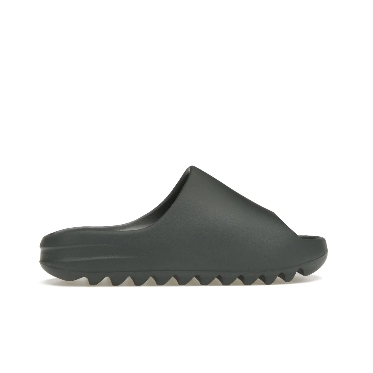 adidas Yeezy Slide Slate Marine - Image 36 - Only at www.BallersClubKickz.com - Discover the Adidas Yeezy Slide Slate Marine. With a Slate Marine colorway, contrasting outsole, and matching strap, these sandals make a timeless fashion statement. Out August 11th, 2023.