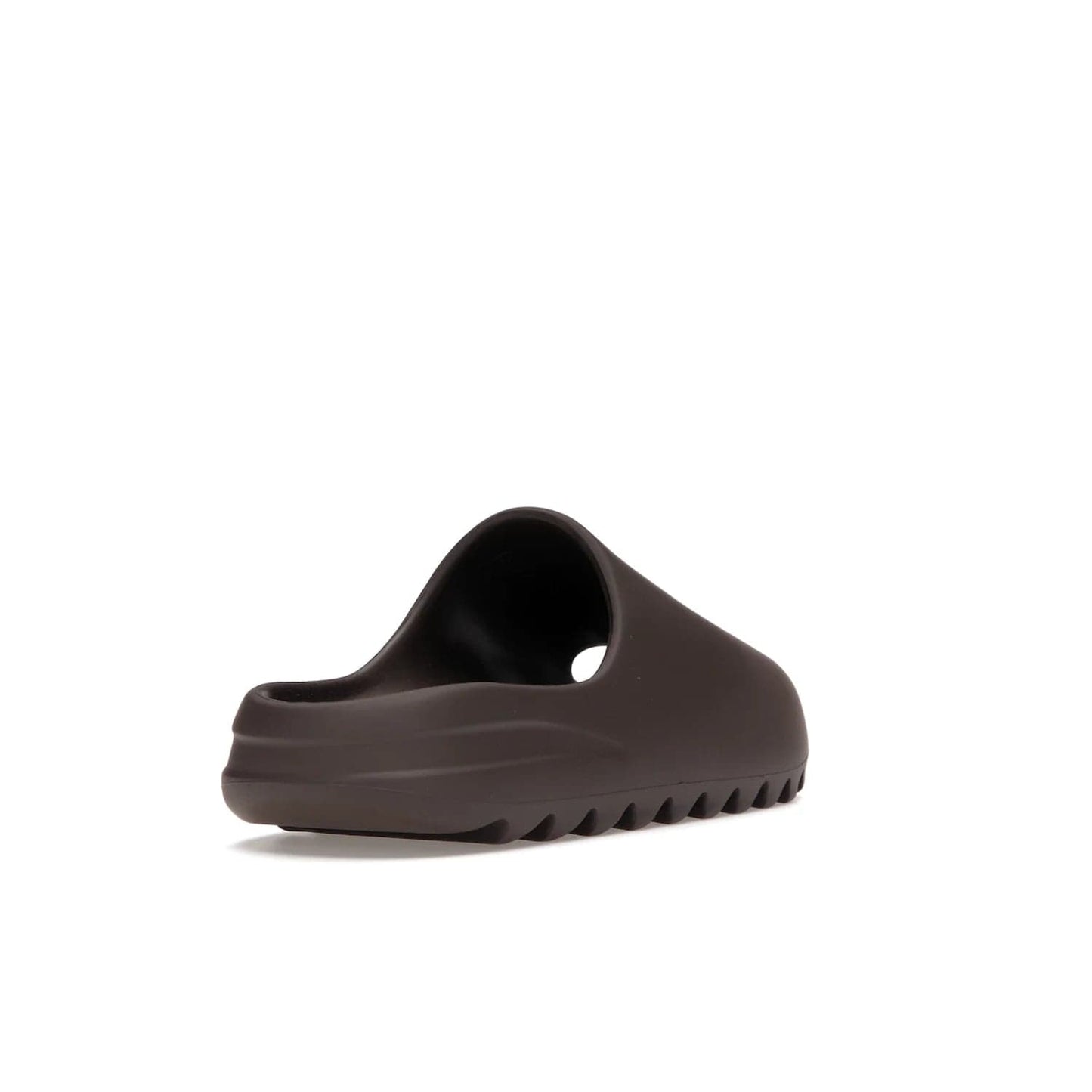 adidas Yeezy Slide Soot - Image 31 - Only at www.BallersClubKickz.com - Shop the Yeezy Slide Soot sneaker by Adidas, a sleek blend of form and function. Monochrome silhouette in Soot/Soot/Soot. Lightweight EVA foam offers comfort and durability. Get the must-have style today.