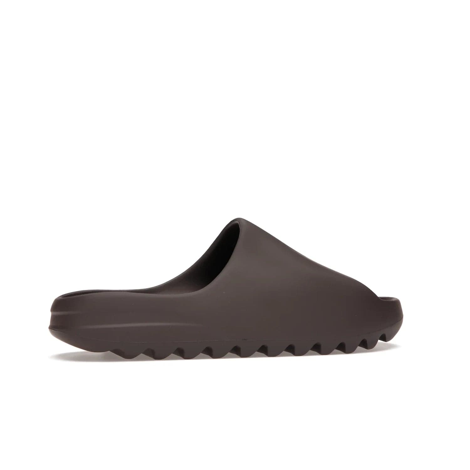 adidas Yeezy Slide Soot - Image 35 - Only at www.BallersClubKickz.com - Shop the Yeezy Slide Soot sneaker by Adidas, a sleek blend of form and function. Monochrome silhouette in Soot/Soot/Soot. Lightweight EVA foam offers comfort and durability. Get the must-have style today.