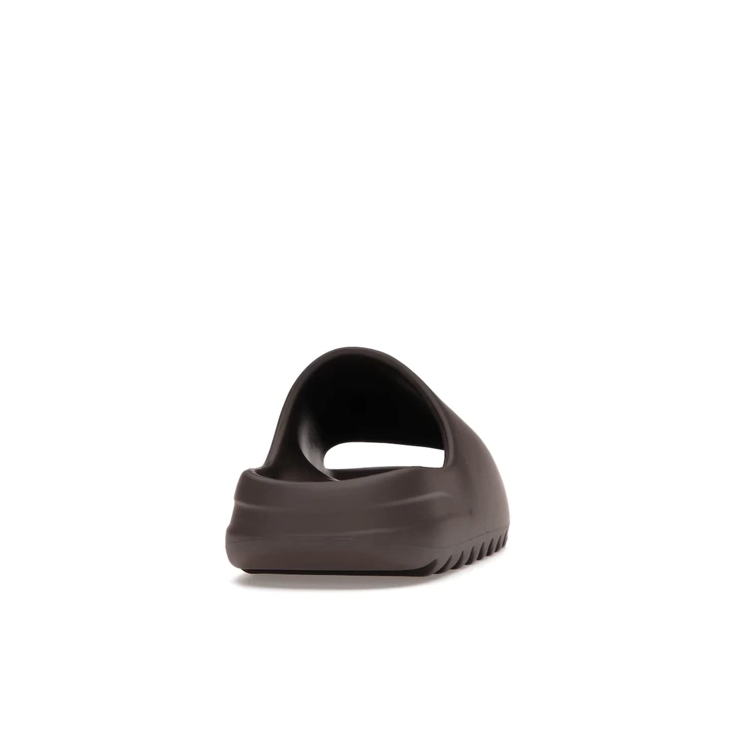 adidas Yeezy Slide Soot - Image 29 - Only at www.BallersClubKickz.com - Shop the Yeezy Slide Soot sneaker by Adidas, a sleek blend of form and function. Monochrome silhouette in Soot/Soot/Soot. Lightweight EVA foam offers comfort and durability. Get the must-have style today.
