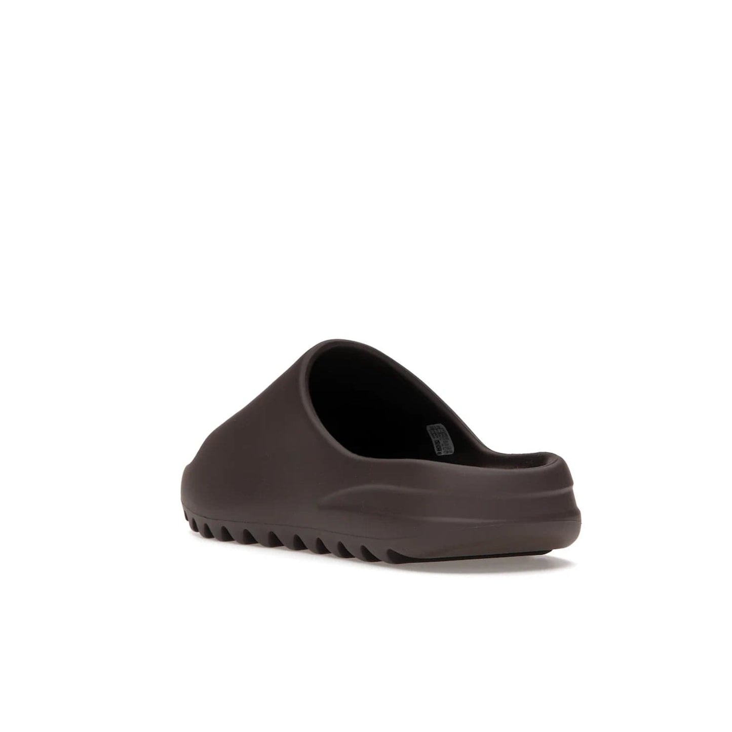 adidas Yeezy Slide Soot - Image 25 - Only at www.BallersClubKickz.com - Shop the Yeezy Slide Soot sneaker by Adidas, a sleek blend of form and function. Monochrome silhouette in Soot/Soot/Soot. Lightweight EVA foam offers comfort and durability. Get the must-have style today.