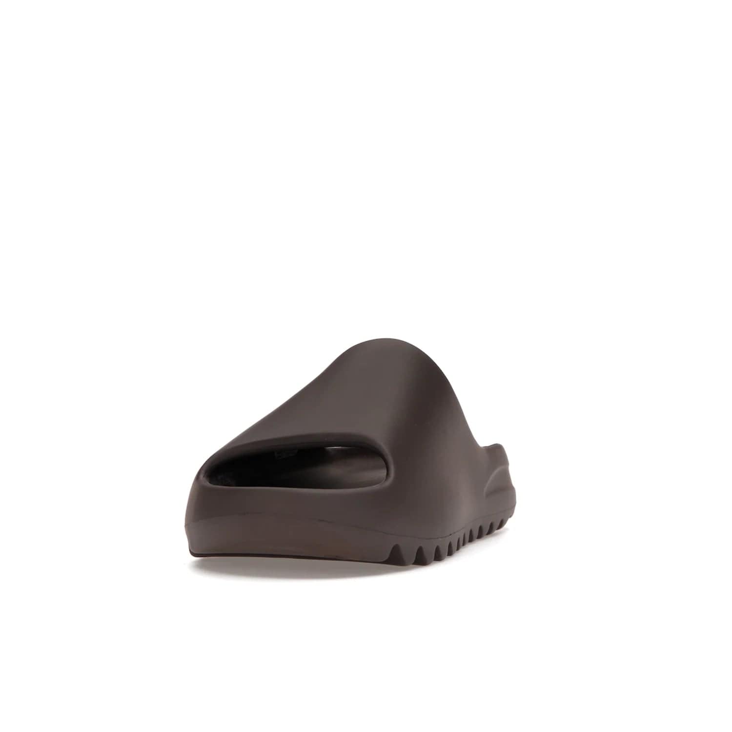 adidas Yeezy Slide Soot - Image 12 - Only at www.BallersClubKickz.com - Shop the Yeezy Slide Soot sneaker by Adidas, a sleek blend of form and function. Monochrome silhouette in Soot/Soot/Soot. Lightweight EVA foam offers comfort and durability. Get the must-have style today.