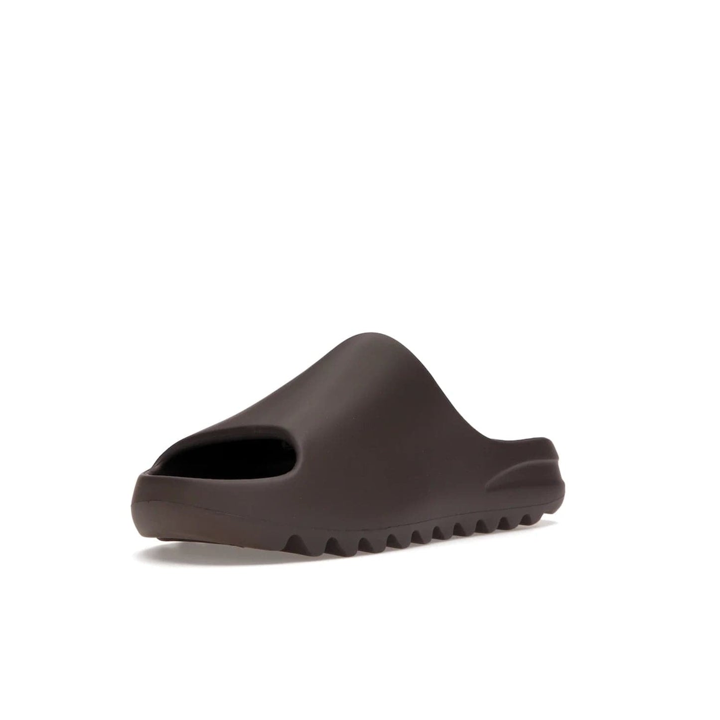adidas Yeezy Slide Soot - Image 14 - Only at www.BallersClubKickz.com - Shop the Yeezy Slide Soot sneaker by Adidas, a sleek blend of form and function. Monochrome silhouette in Soot/Soot/Soot. Lightweight EVA foam offers comfort and durability. Get the must-have style today.