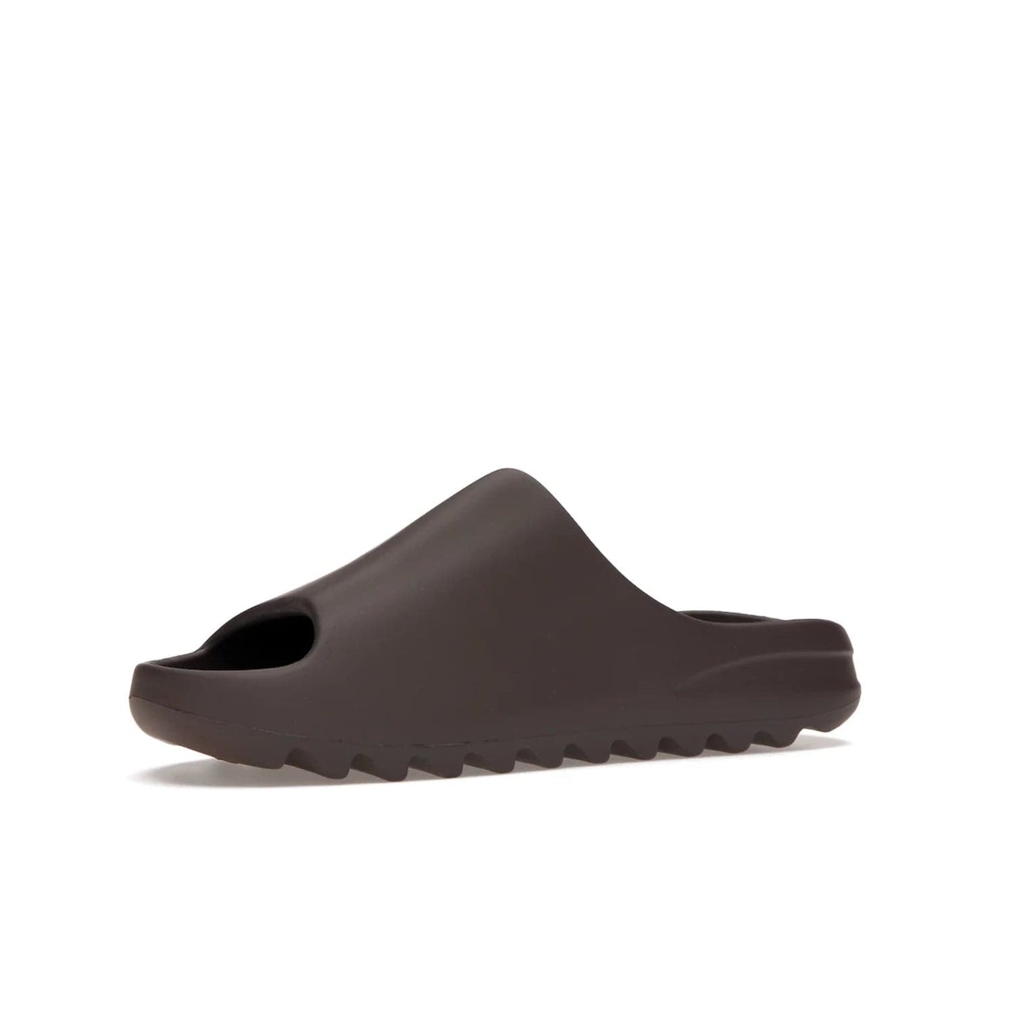 adidas Yeezy Slide Soot - Image 16 - Only at www.BallersClubKickz.com - Shop the Yeezy Slide Soot sneaker by Adidas, a sleek blend of form and function. Monochrome silhouette in Soot/Soot/Soot. Lightweight EVA foam offers comfort and durability. Get the must-have style today.