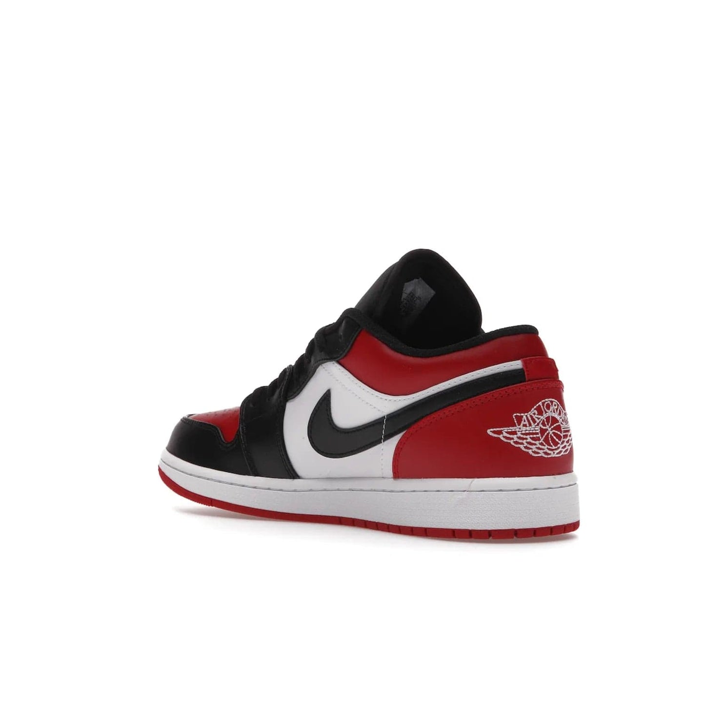 Jordan 1 Low Bred Toe - Image 24 - Only at www.BallersClubKickz.com - Step into the iconic Jordan 1 Retro. Mixing and matching of leather in red, black, and white makes for a unique colorway. Finished off with a Wing logo embroidery & Jumpman label. Comfortable and stylish at an affordable $100, the Jordan 1 Low Bred Toe is perfect for any true sneaker fan.