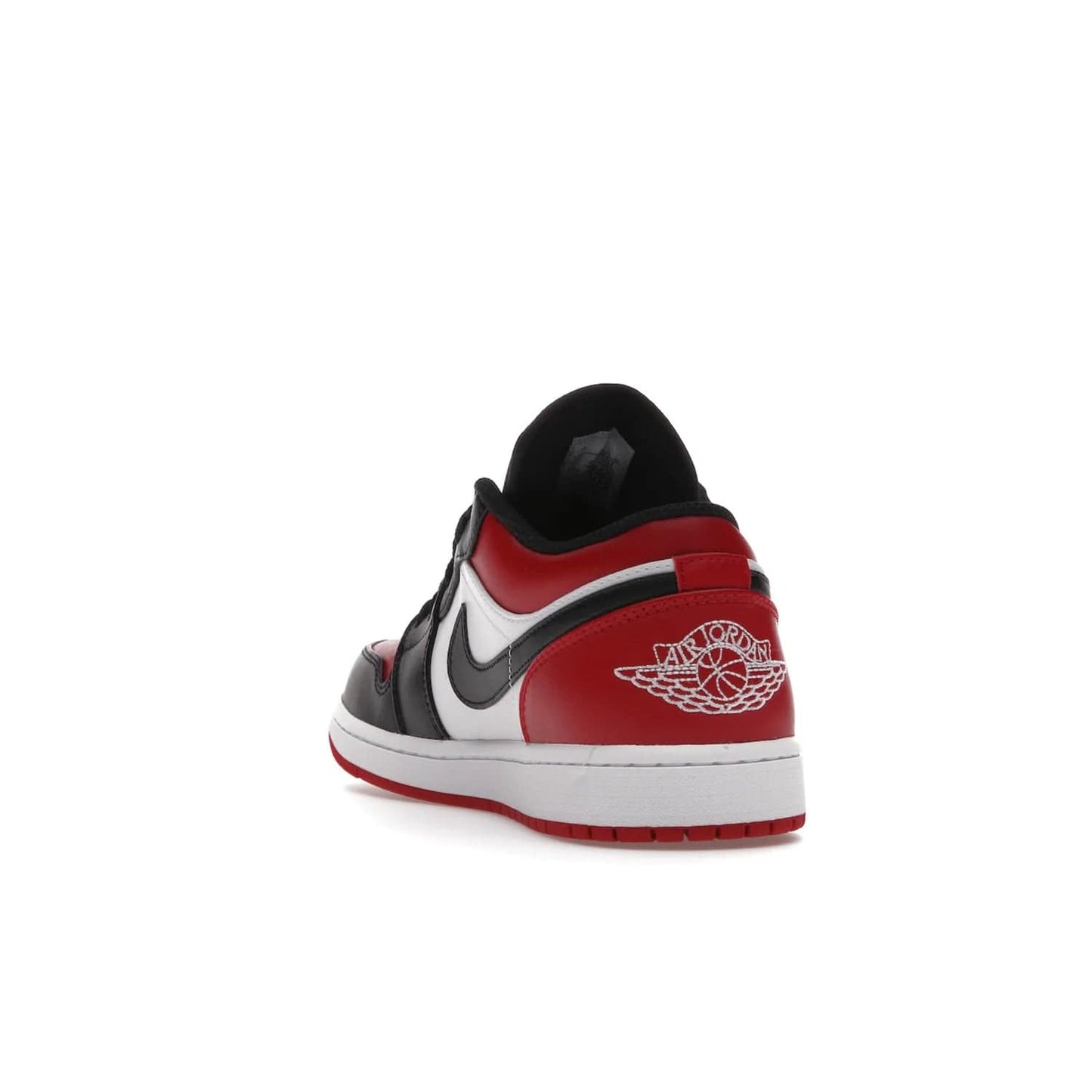 Jordan 1 Low Bred Toe - Image 26 - Only at www.BallersClubKickz.com - Step into the iconic Jordan 1 Retro. Mixing and matching of leather in red, black, and white makes for a unique colorway. Finished off with a Wing logo embroidery & Jumpman label. Comfortable and stylish at an affordable $100, the Jordan 1 Low Bred Toe is perfect for any true sneaker fan.