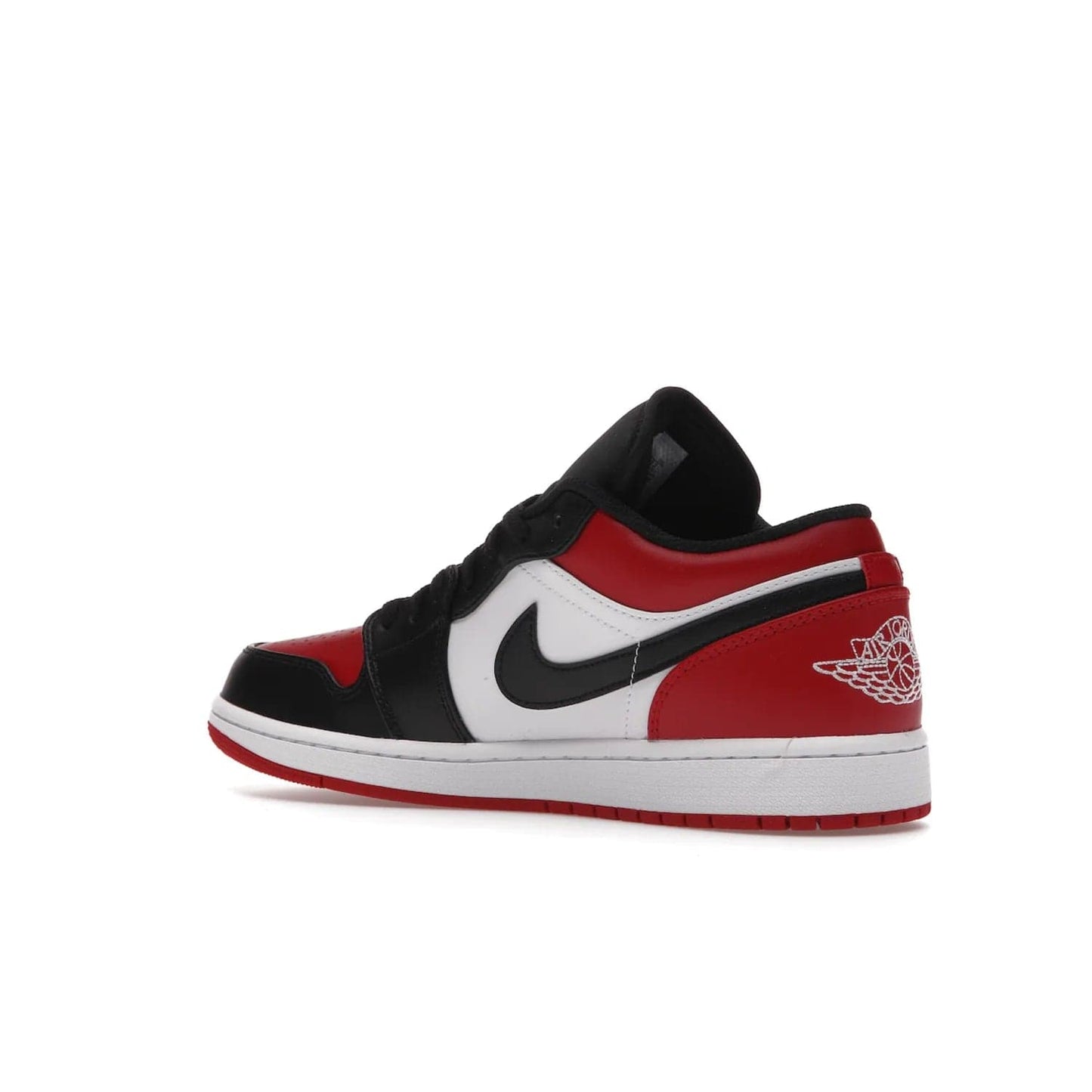 Jordan 1 Low Bred Toe - Image 23 - Only at www.BallersClubKickz.com - Step into the iconic Jordan 1 Retro. Mixing and matching of leather in red, black, and white makes for a unique colorway. Finished off with a Wing logo embroidery & Jumpman label. Comfortable and stylish at an affordable $100, the Jordan 1 Low Bred Toe is perfect for any true sneaker fan.