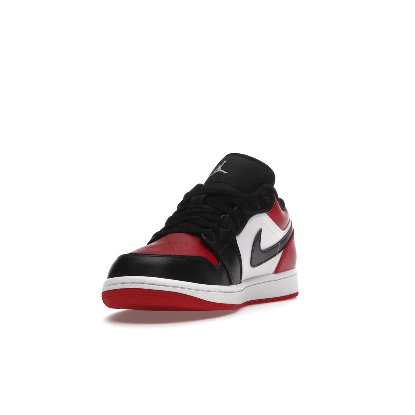 Jordan 1 Low Bred Toe - Image 13 - Only at www.BallersClubKickz.com - Step into the iconic Jordan 1 Retro. Mixing and matching of leather in red, black, and white makes for a unique colorway. Finished off with a Wing logo embroidery & Jumpman label. Comfortable and stylish at an affordable $100, the Jordan 1 Low Bred Toe is perfect for any true sneaker fan.