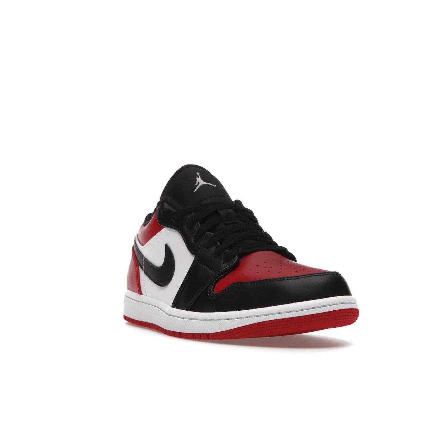 Jordan 1 Low Bred Toe - Image 7 - Only at www.BallersClubKickz.com - Step into the iconic Jordan 1 Retro. Mixing and matching of leather in red, black, and white makes for a unique colorway. Finished off with a Wing logo embroidery & Jumpman label. Comfortable and stylish at an affordable $100, the Jordan 1 Low Bred Toe is perfect for any true sneaker fan.