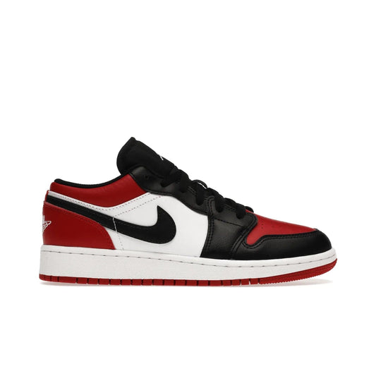 Jordan 1 Low Bred Toe (GS) - Image 1 - Only at www.BallersClubKickz.com - #
Iconic sneaker from Jordan brand with classic colorway, unique detailing & Air Jordan Wings logo. Step into the shoes of the greats with the Jordan 1 Low Bred Toe GS!