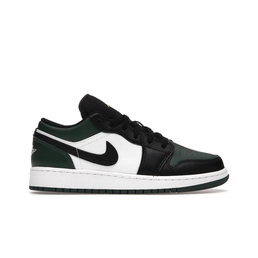 Jordan 1 Low Green Toe (GS) - Image 1 - Only at www.BallersClubKickz.com - Get the perfect low cut Jordans. Shop the Air Jordan 1 Low Noble Green GS shoes with its unique colorway and stencil Jumpman logo. Available October 2021.