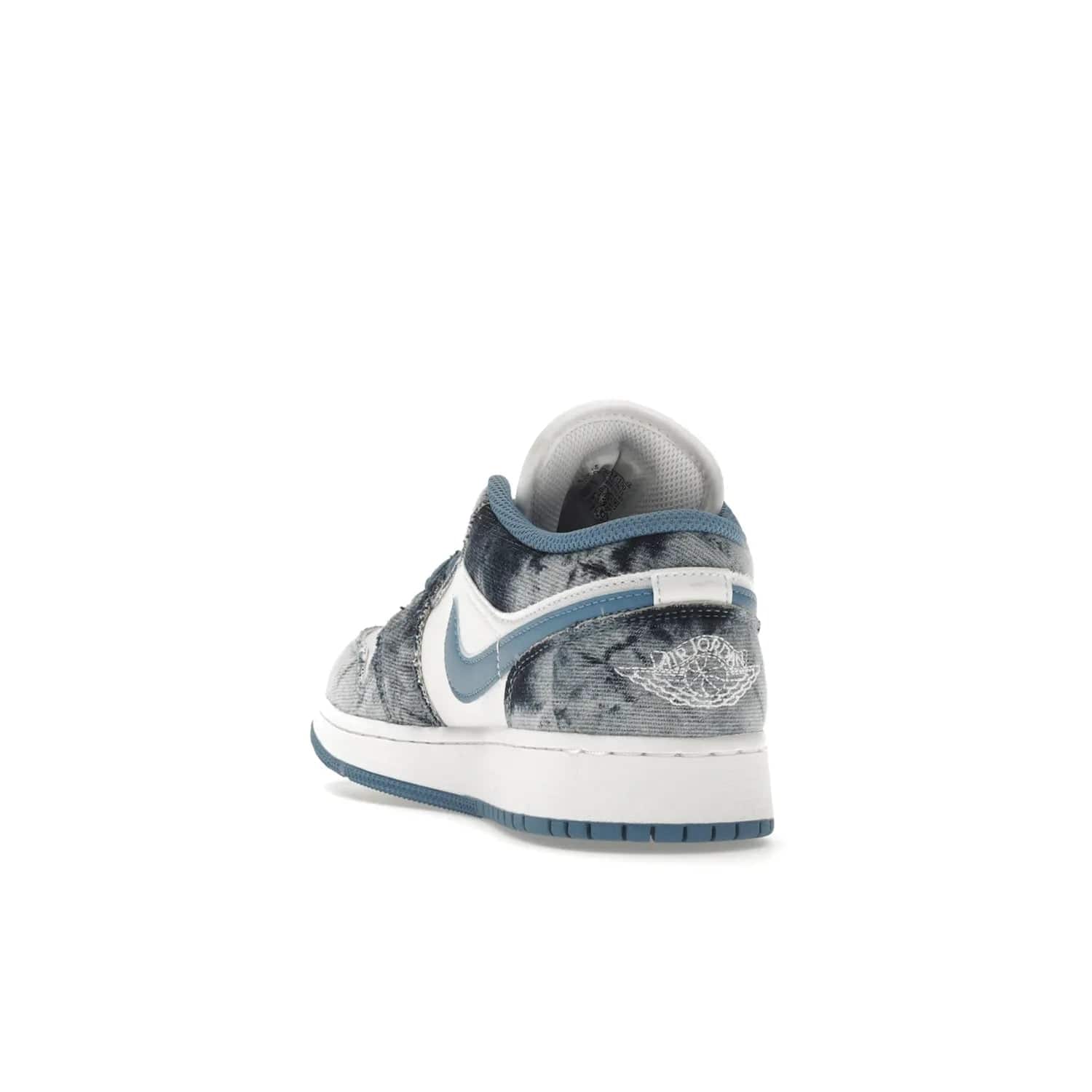Jordan 1 Low Washed Denim (GS) - Image 26 - Only at www.BallersClubKickz.com - A classic Nike silhouette with a modern twist. The Air Jordan 1 Low Washed Denim (GS) for grade schoolers features a pattern of black, gray, blue, and white, blue laces, and a bright royal blue sole. Perfect for any sneaker collector.