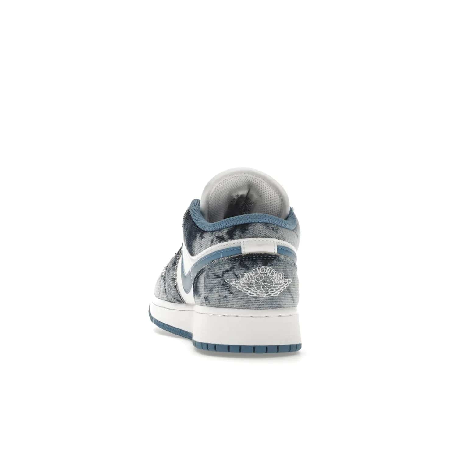 Jordan 1 Low Washed Denim (GS) - Image 27 - Only at www.BallersClubKickz.com - A classic Nike silhouette with a modern twist. The Air Jordan 1 Low Washed Denim (GS) for grade schoolers features a pattern of black, gray, blue, and white, blue laces, and a bright royal blue sole. Perfect for any sneaker collector.
