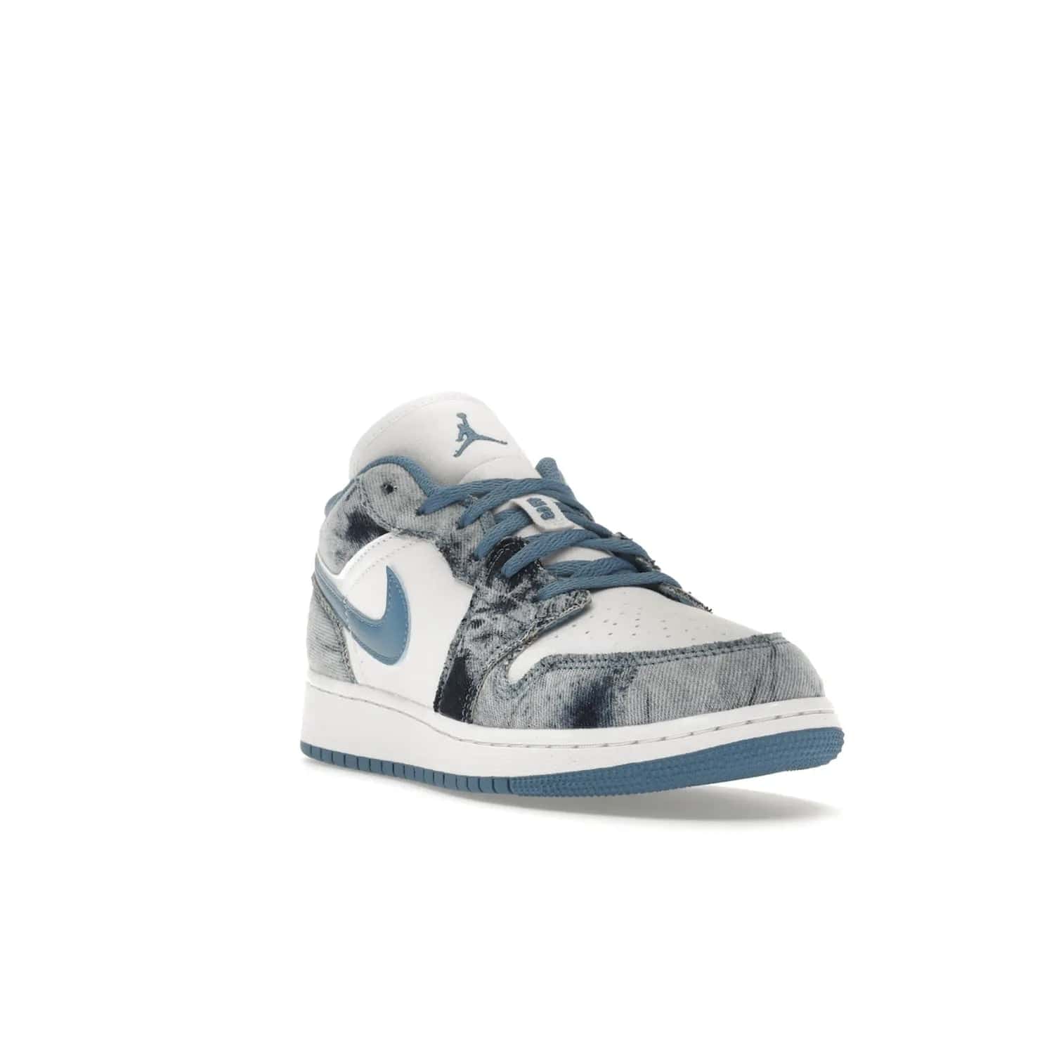 Jordan 1 Low Washed Denim (GS) - Image 7 - Only at www.BallersClubKickz.com - A classic Nike silhouette with a modern twist. The Air Jordan 1 Low Washed Denim (GS) for grade schoolers features a pattern of black, gray, blue, and white, blue laces, and a bright royal blue sole. Perfect for any sneaker collector.