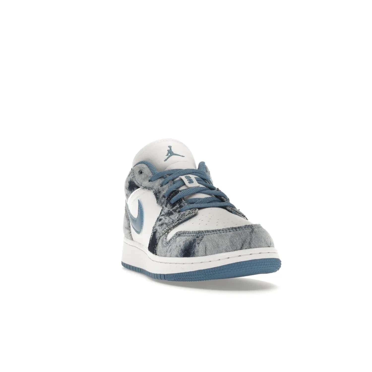 Jordan 1 Low Washed Denim (GS) - Image 8 - Only at www.BallersClubKickz.com - A classic Nike silhouette with a modern twist. The Air Jordan 1 Low Washed Denim (GS) for grade schoolers features a pattern of black, gray, blue, and white, blue laces, and a bright royal blue sole. Perfect for any sneaker collector.