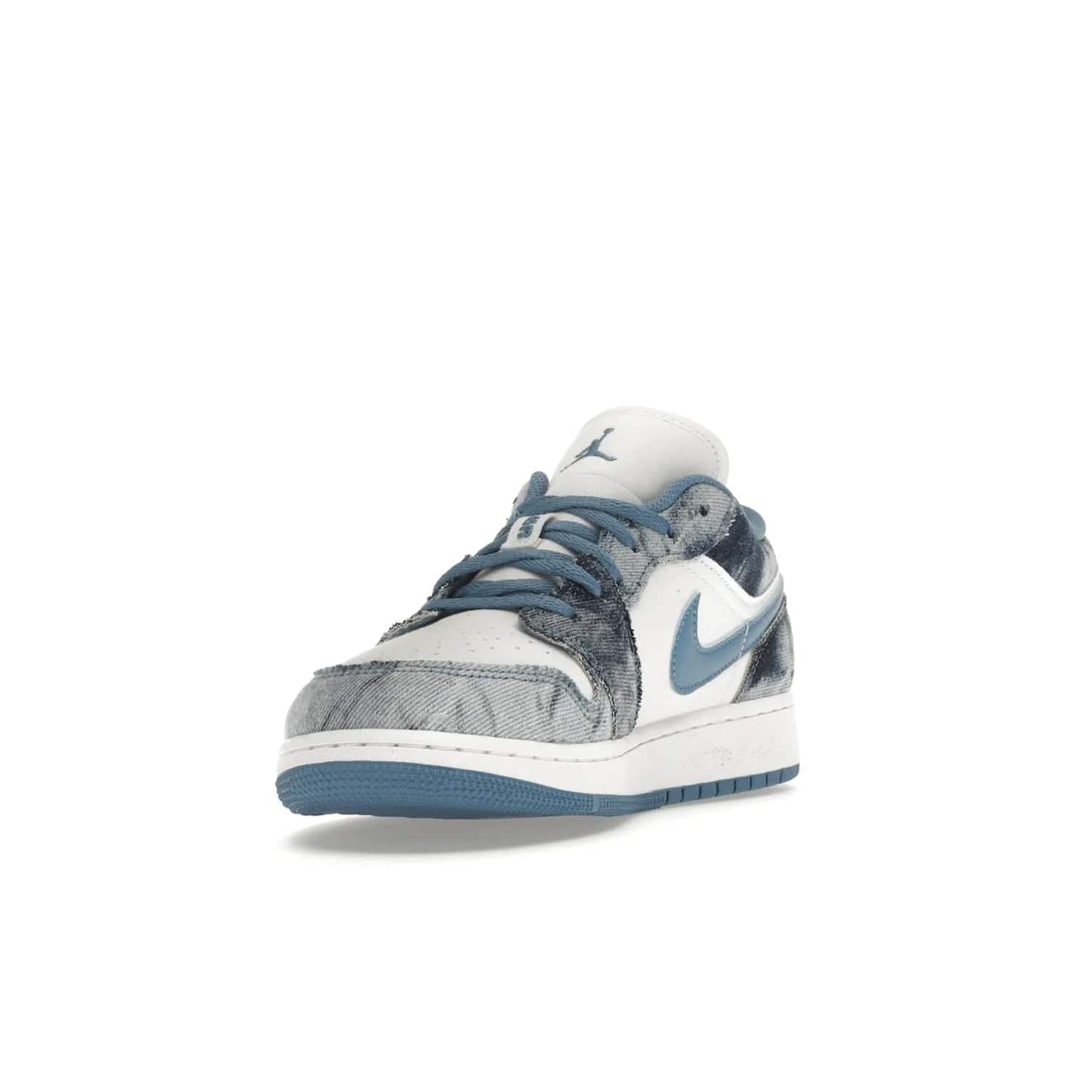 Jordan 1 Low Washed Denim (GS) - Image 13 - Only at www.BallersClubKickz.com - A classic Nike silhouette with a modern twist. The Air Jordan 1 Low Washed Denim (GS) for grade schoolers features a pattern of black, gray, blue, and white, blue laces, and a bright royal blue sole. Perfect for any sneaker collector.
