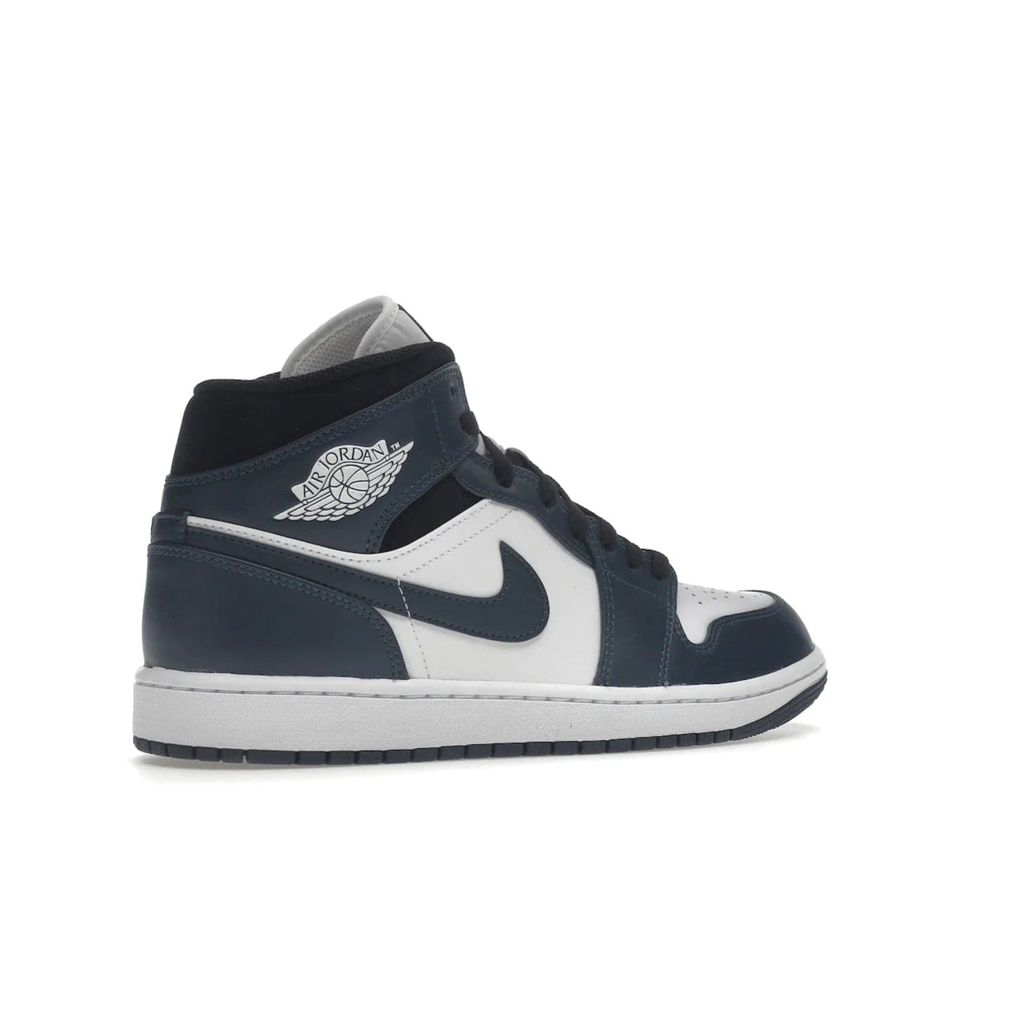Jordan 1 Mid Armory Navy - Image 34 - Only at www.BallersClubKickz.com - The Jordan 1 Mid Armory Navy: classic basketball sneaker with soft white leather upper, deep navy blue overlays, and black leather ankle detailing. Iconic style with Jordan Wings logo and Jumpman label.